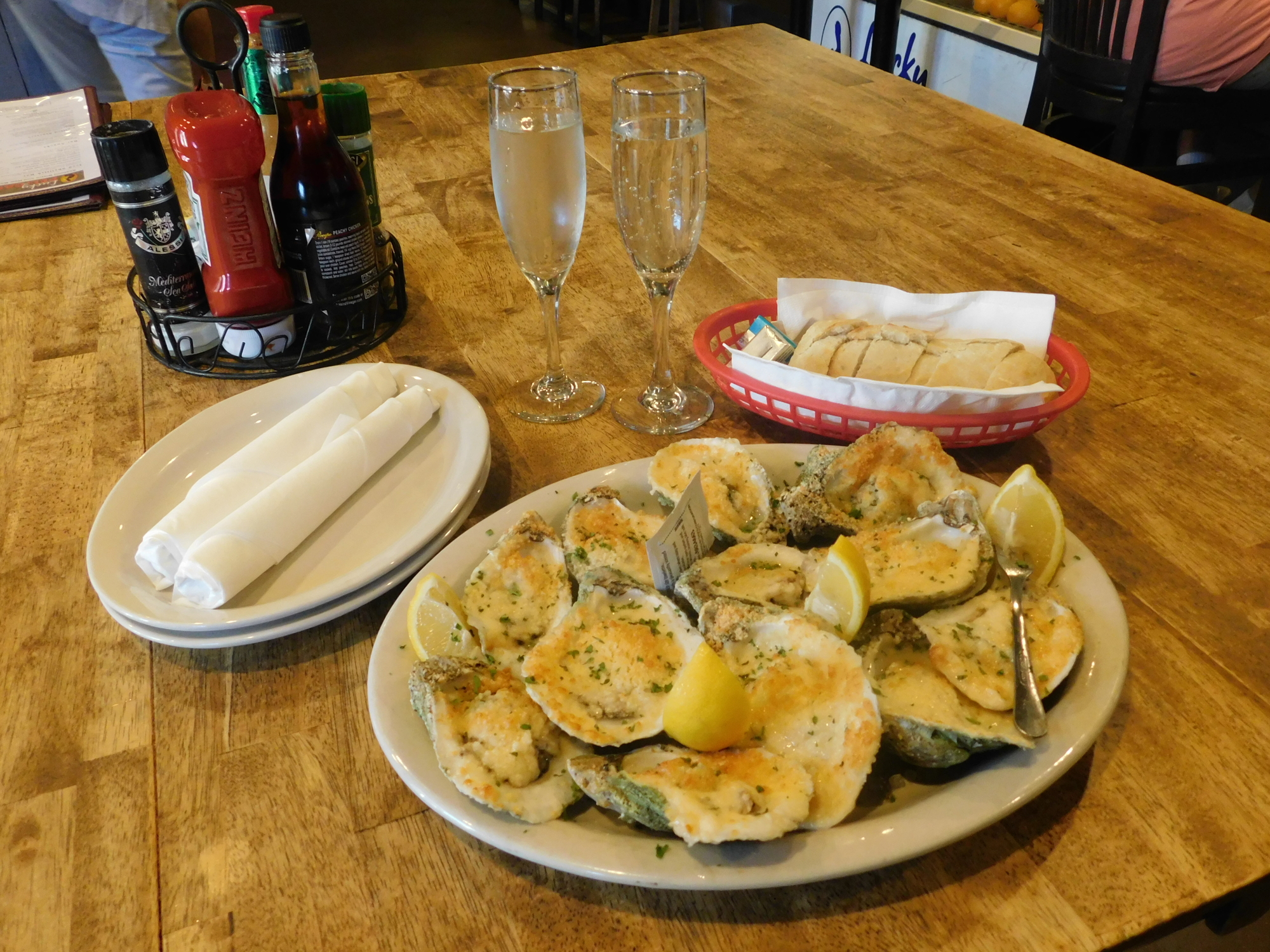 You know what the say oysters are good for — appetizers, particularly the roasted oysters at Lucky Pelican Bistro.   (Klint Lowry)