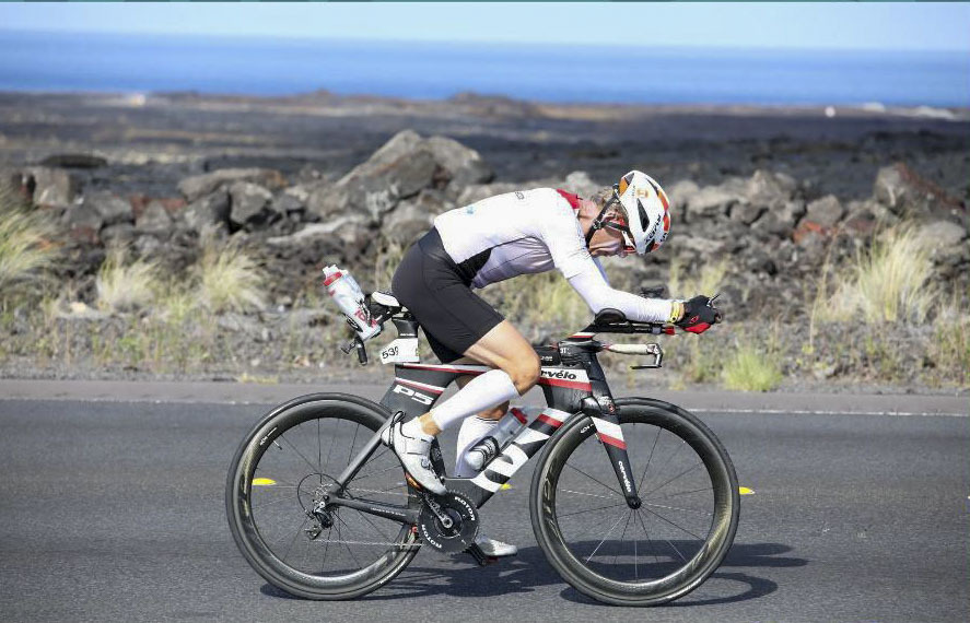 Ed Rymer competes in the bike section of the 2019 World Championship IronMan. 