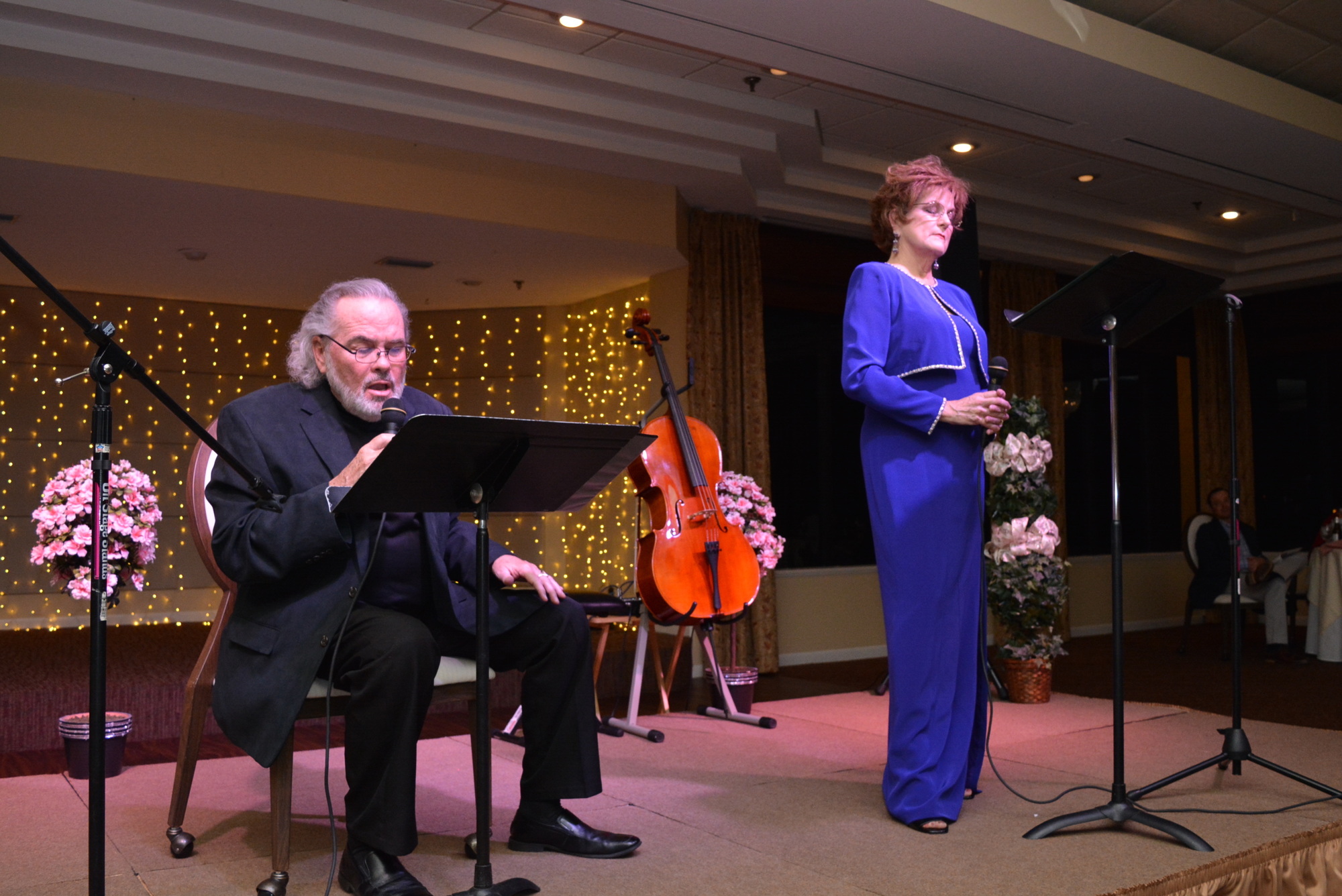 Randy Locke and Carol Sparrow perform at last year's OASIS benefit. They like make the event appealing to all — dressy but not formal, with a similar approach to the musical lineup. (Courtesy photo)