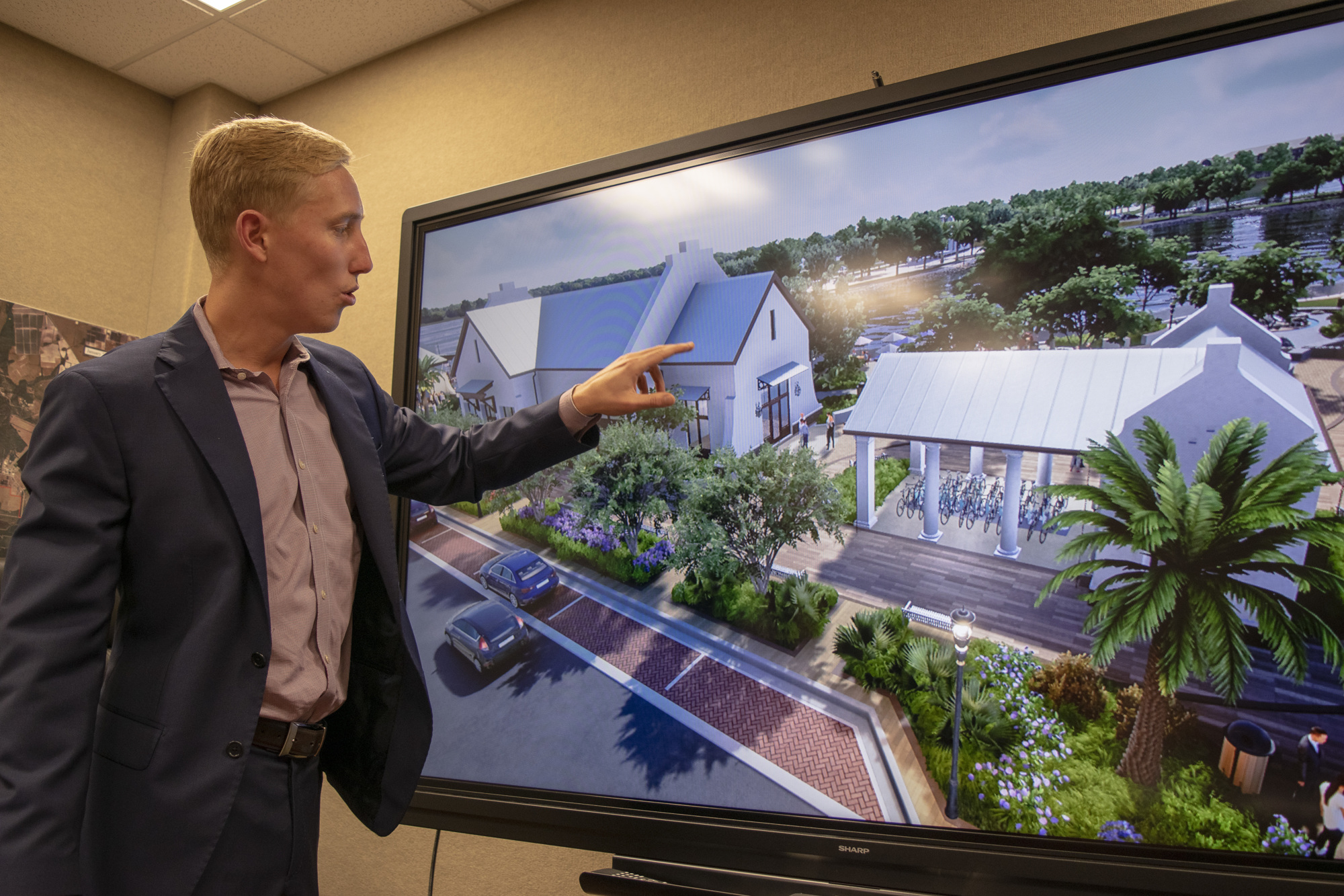 Lakewood Ranch Commercial leasing agent Tom Johnson walks prospective tenants through a detailed 3D model.