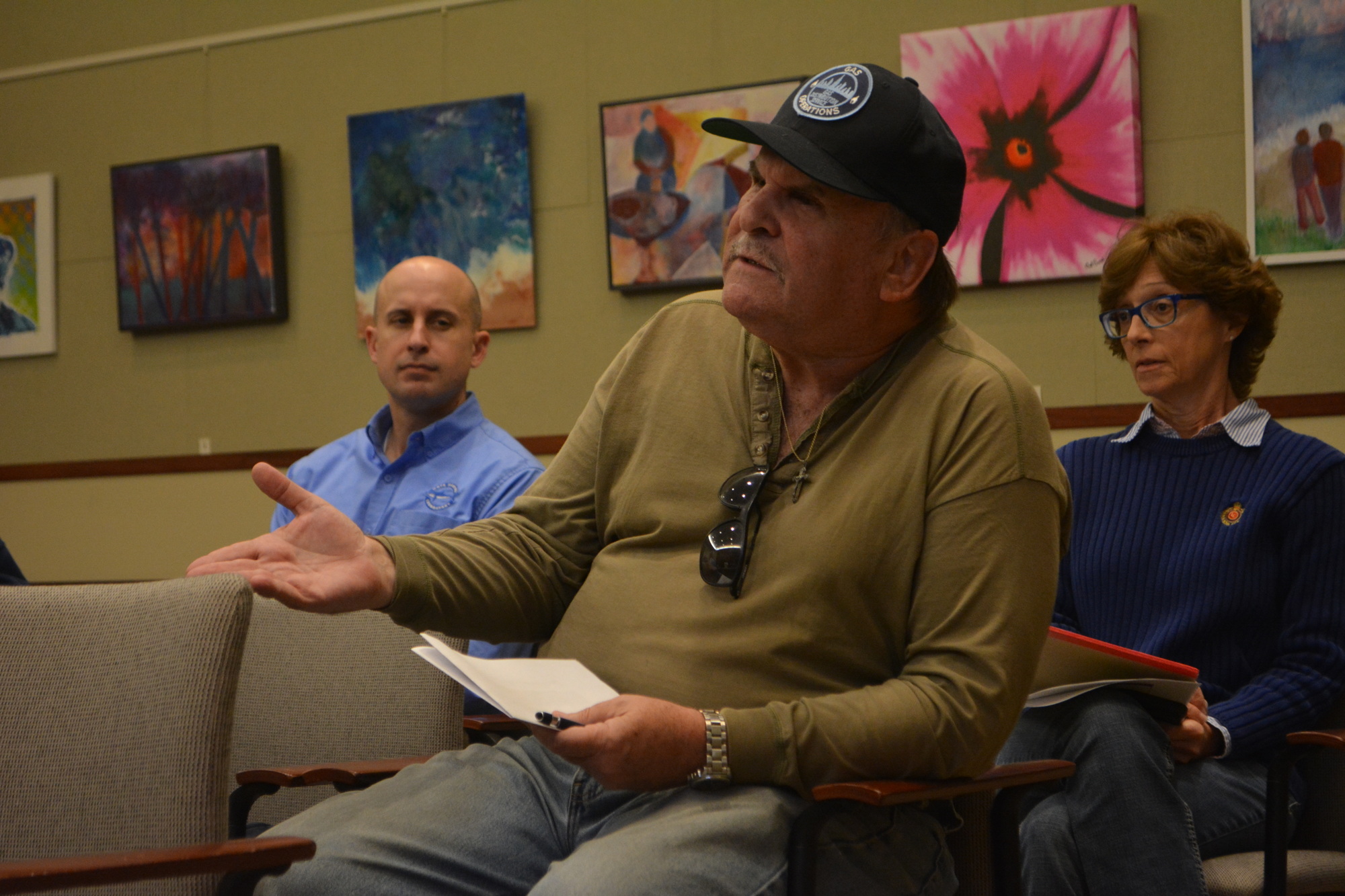 Robert Clarke (foreground) asks a question during a sustainable living workshop Friday morning at Longboat Key Town Hall.