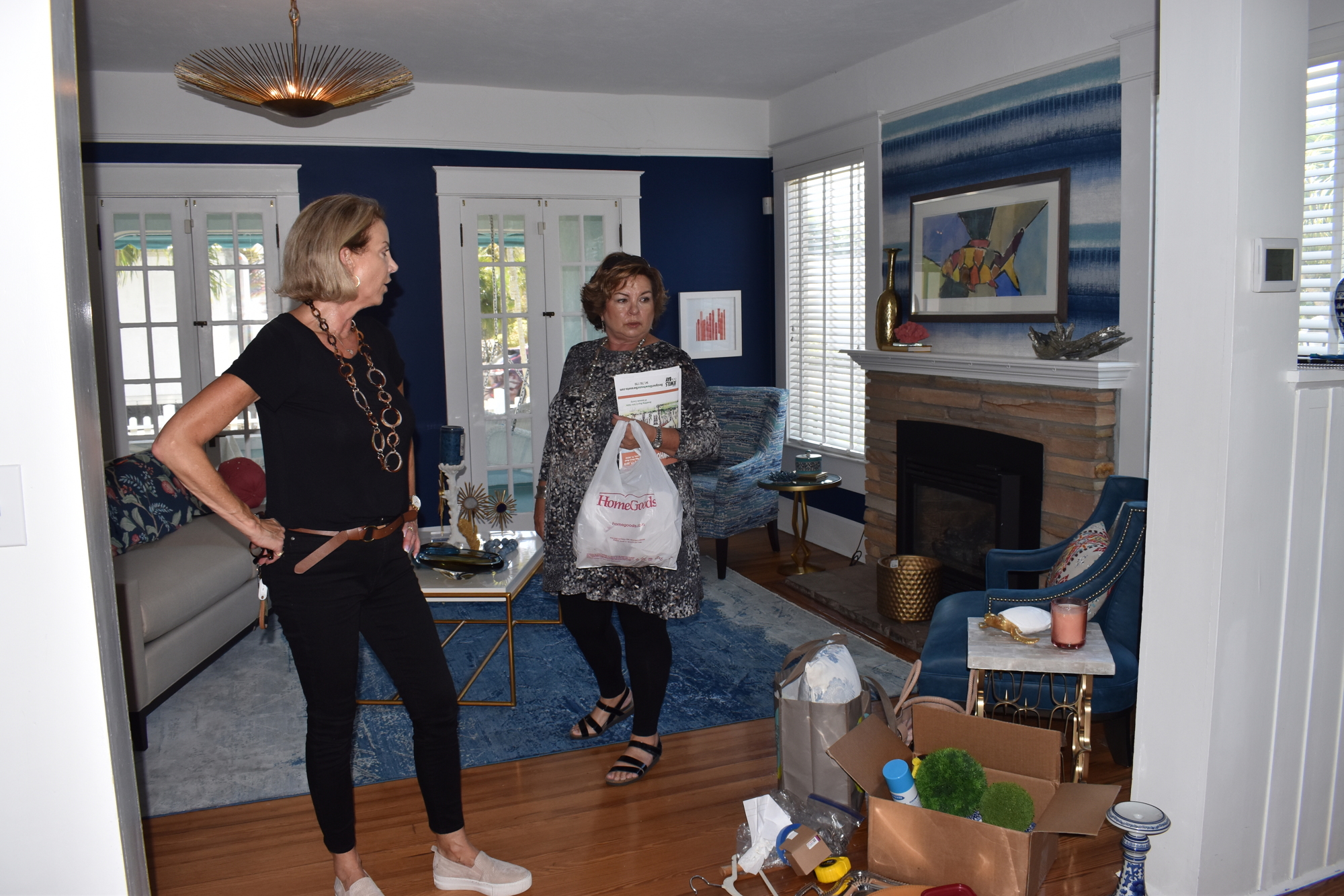 Caroline von Weyher, left, and Marla Oppenheim share a few ideas for their adjoining rooms.