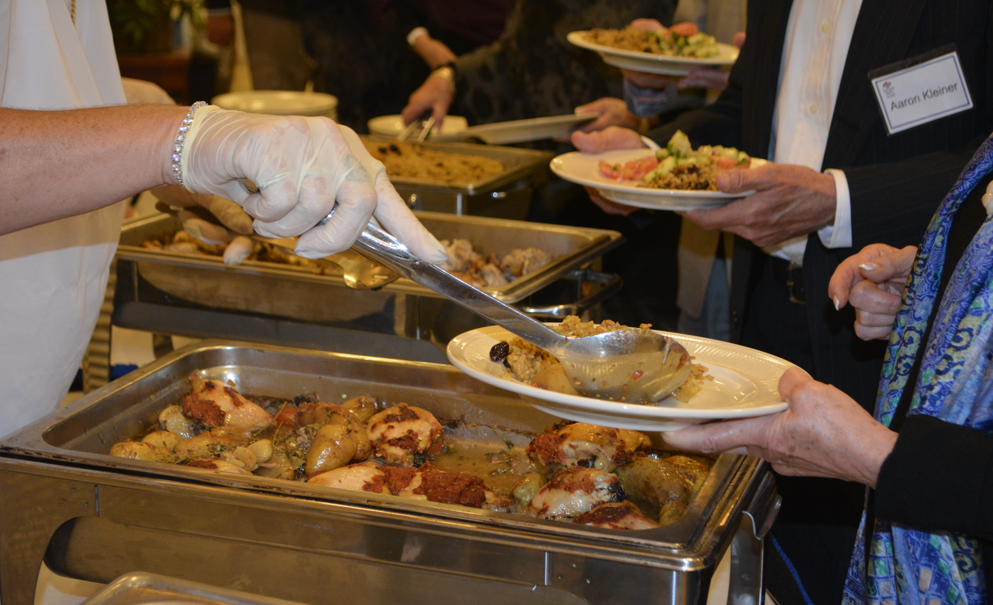 Chicken thighs and potatoes are served at shabbat dinner Friday night during the inaugural Israel Weekend at Temple Beth Israel.
