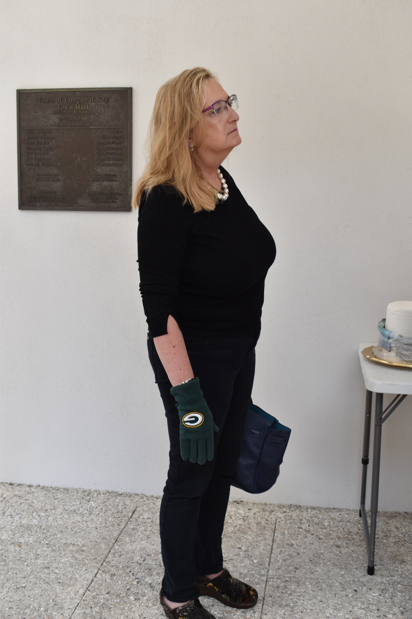 Eileen Kamerick was playing defense against the coronavirus with Green Bay Packers gloves.