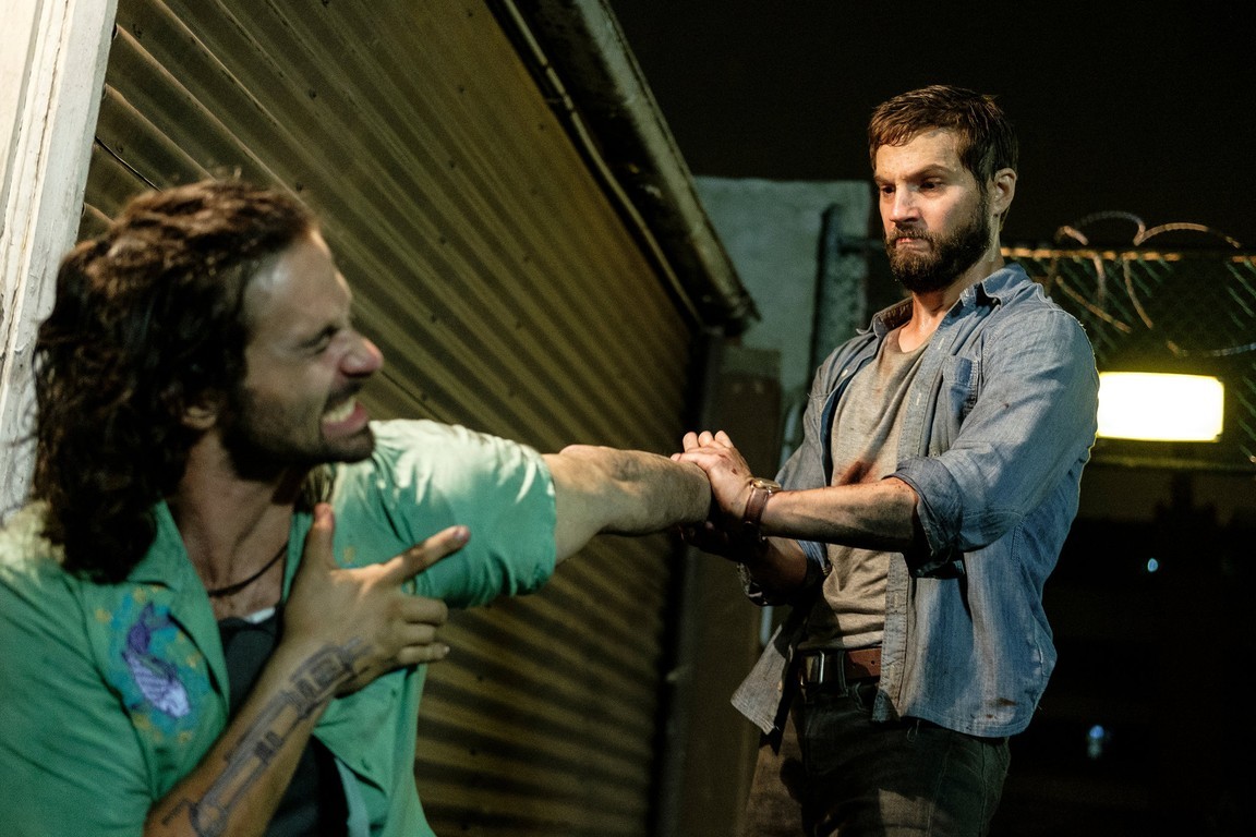 Logan Marshall-Green (right) and some poor sap in 