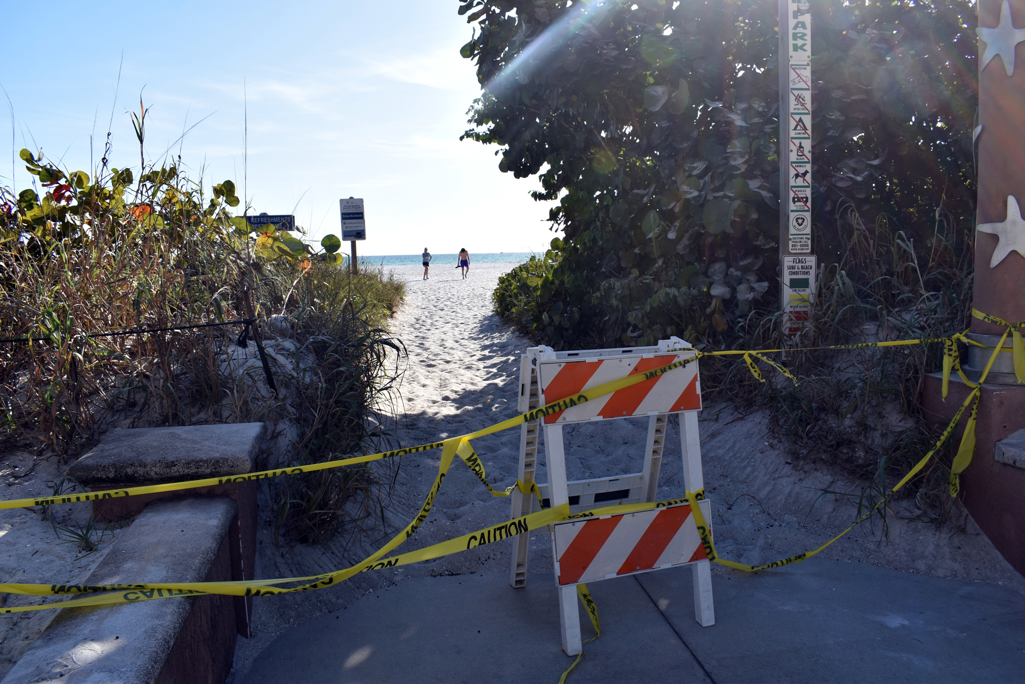 All walking trails to Lido Beach are cordoned off, but that didn't stop several from walking on the beach.