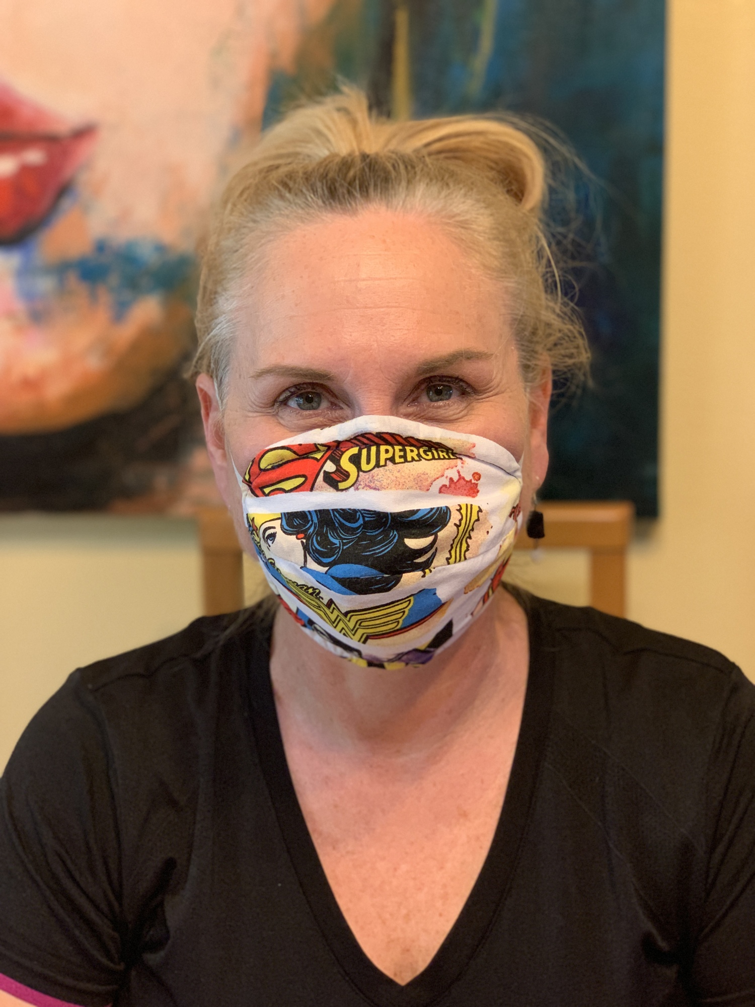 Gates Creek resident Michelle Clinton tries on the prototype for her N95-based mask she is making for local healthcare providers. Courtesy photo.