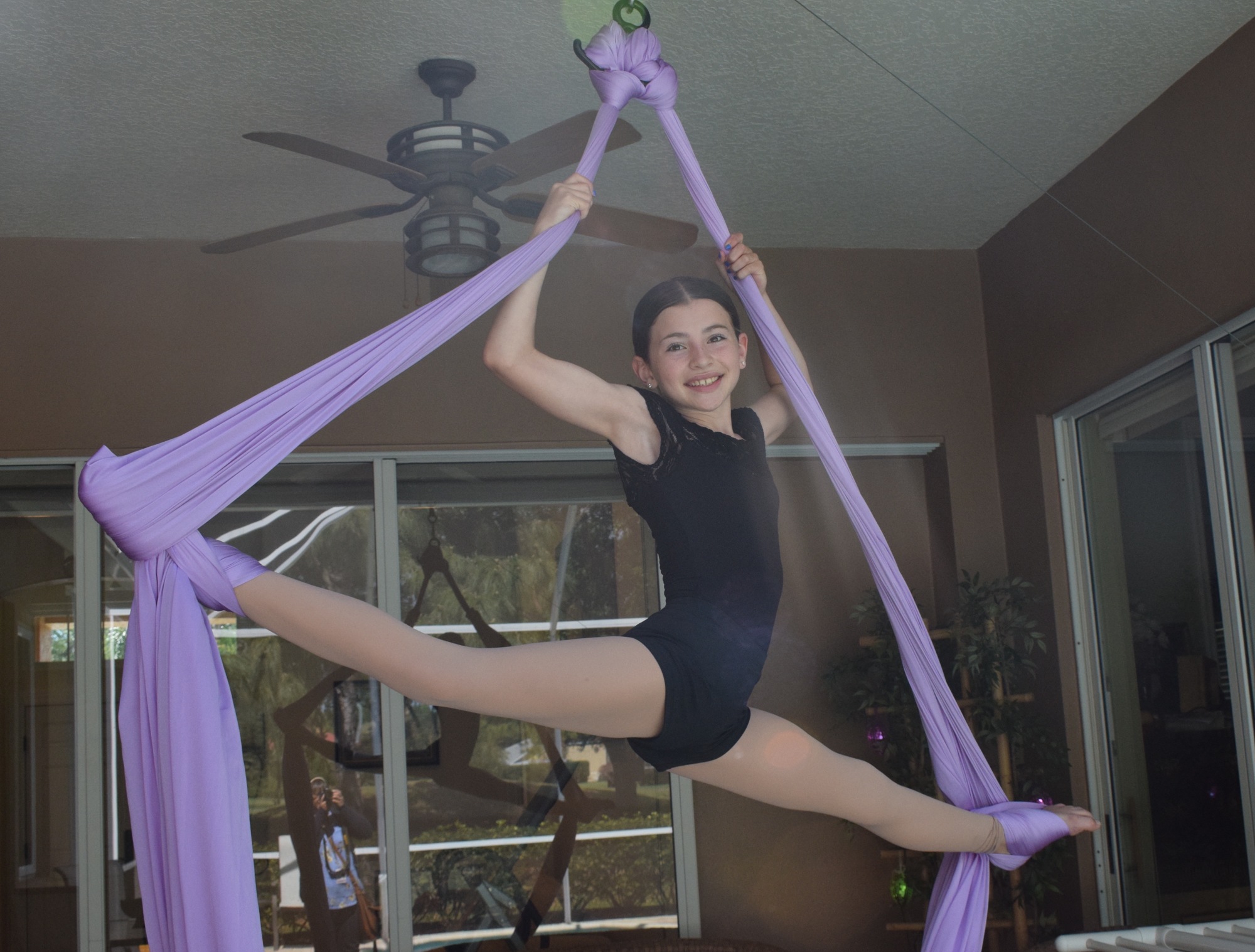 While staying at home due to COVID-19 concerns, Isabella Juliano has started using aerial silks. She hopes to learn how to dance with them.