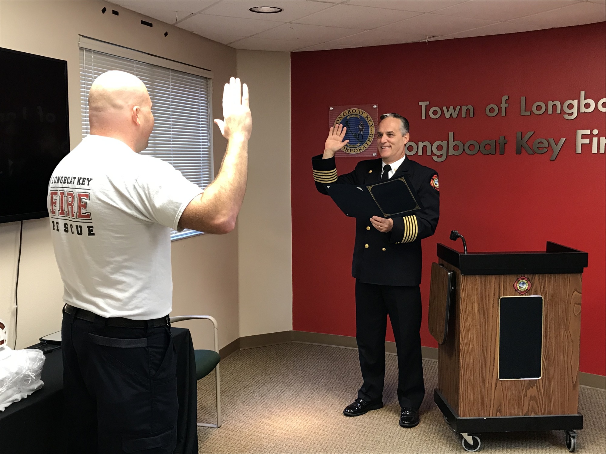 Bryan Carr is promoted from lieutenant to assistant chief of the Longboat Key Fire Rescue Department during Wednesday's 