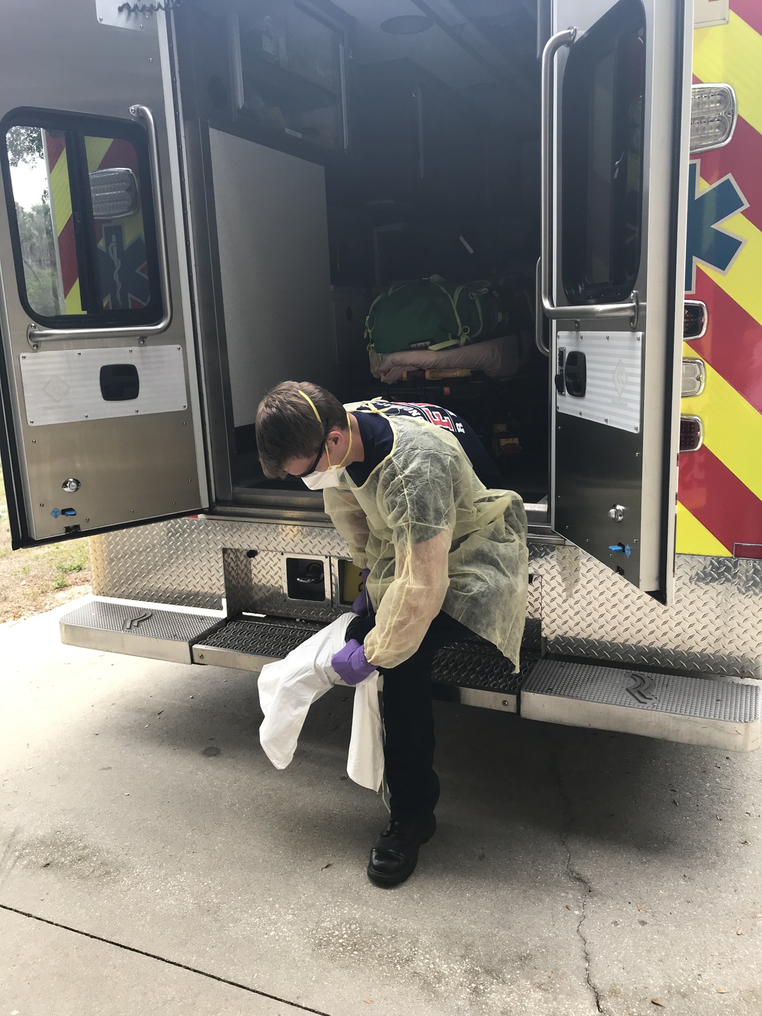 Longboat Key firefighter and paramedic David Oliger is pictured adjusting his equipment.