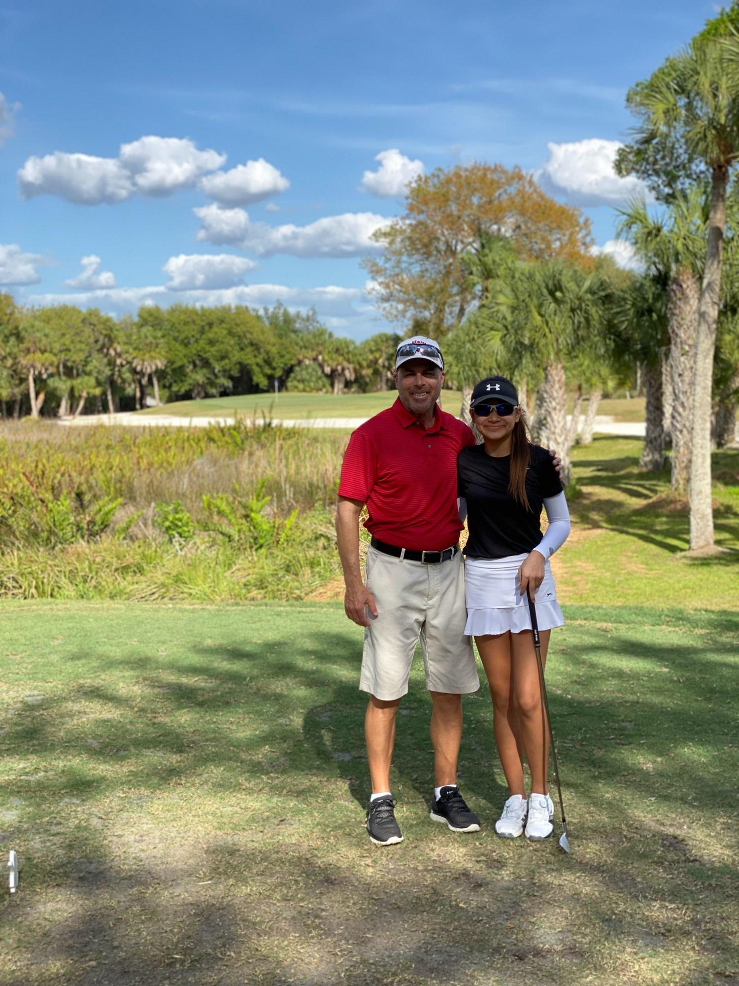 Matthew Kutt, shown playing with his daughter Alana Kutt, says golf is 
