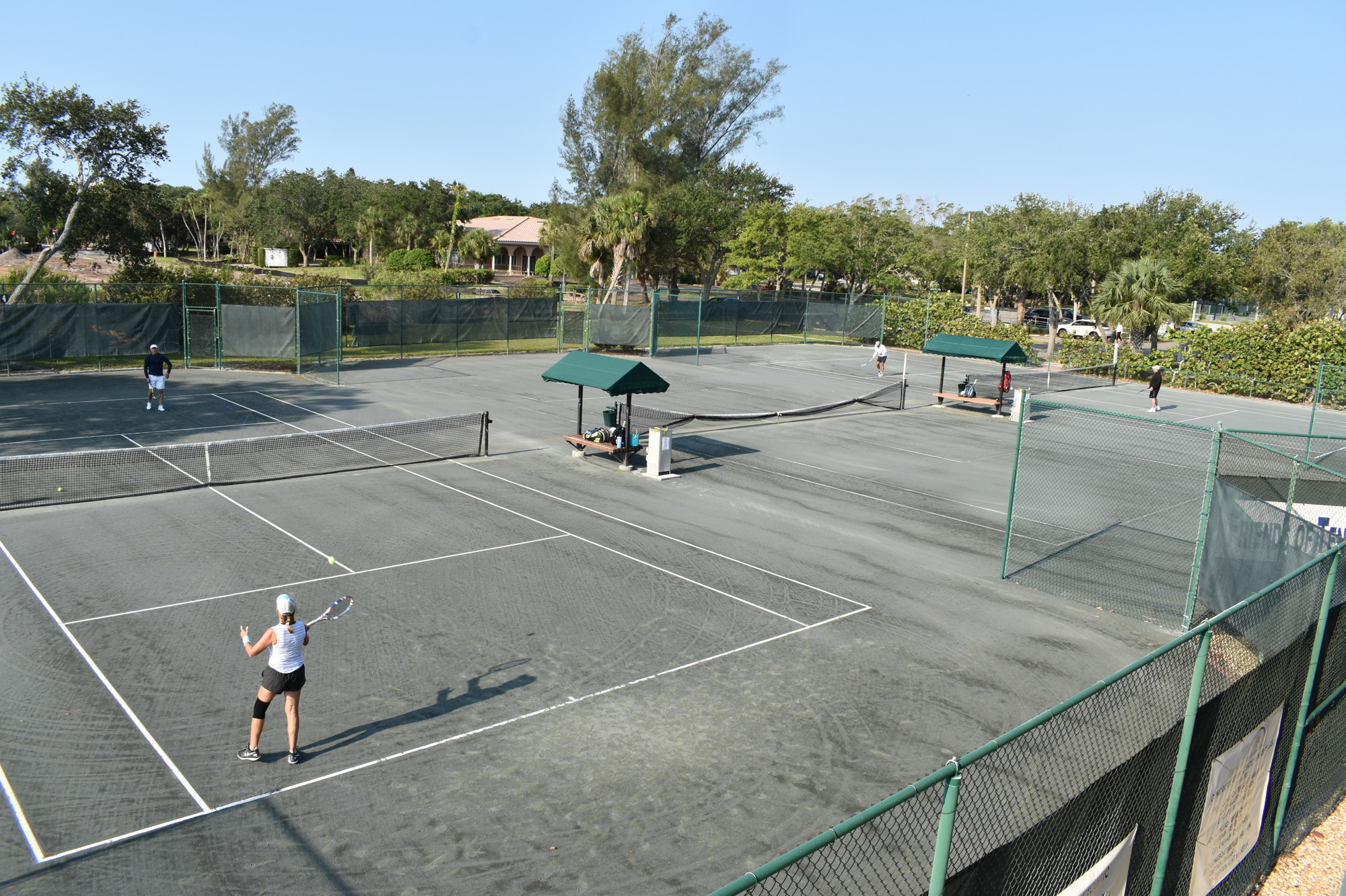 Because of the restrictions to prevent the spread of the COVID-19, every other court is in use at the Longboat Key Tennis Center.