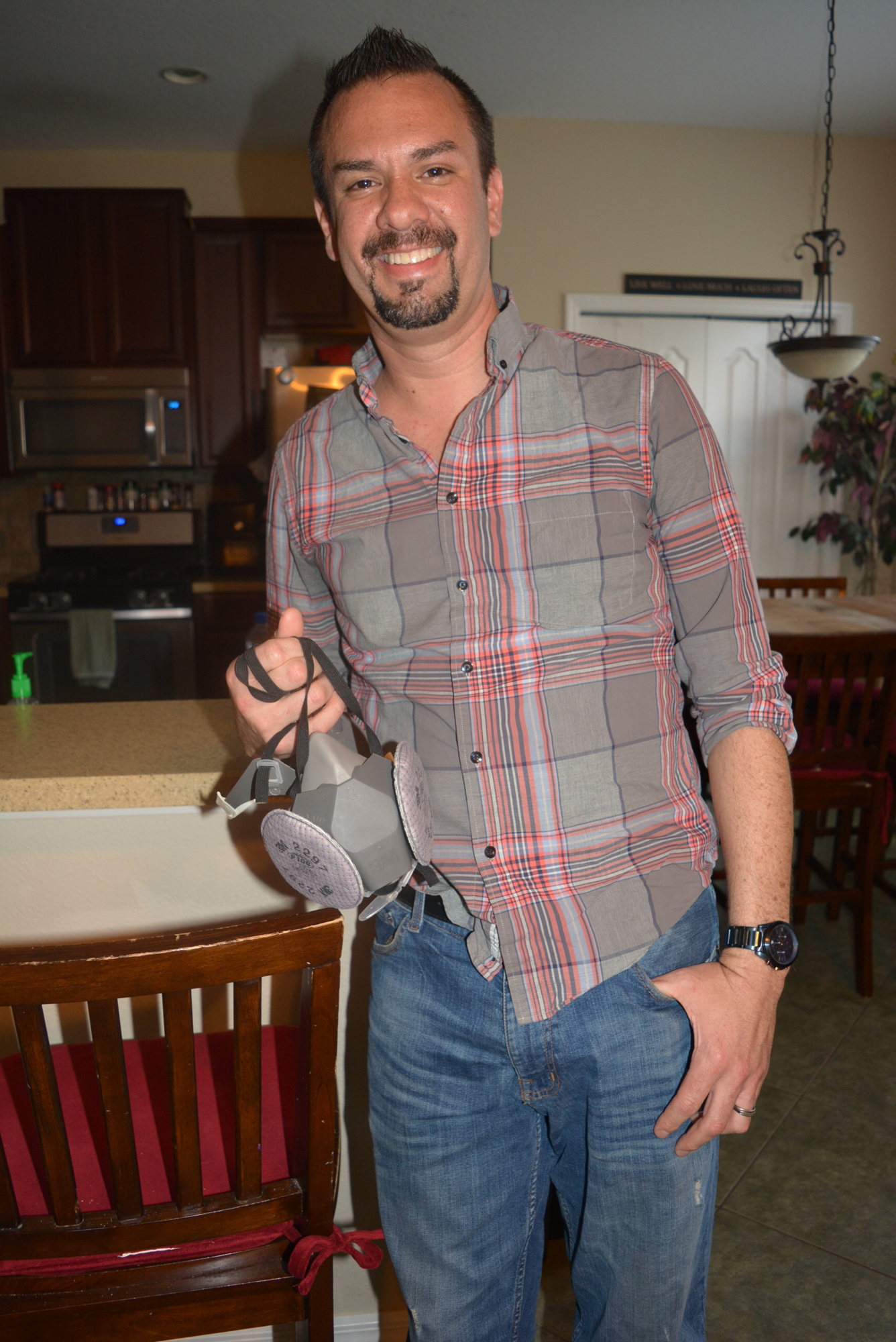 Andrew Arbanas, a nurse at Manatee Memorial Hospital, must wear a respirator and other protective gear while working a 13-hour shift with COVID-19 patients.