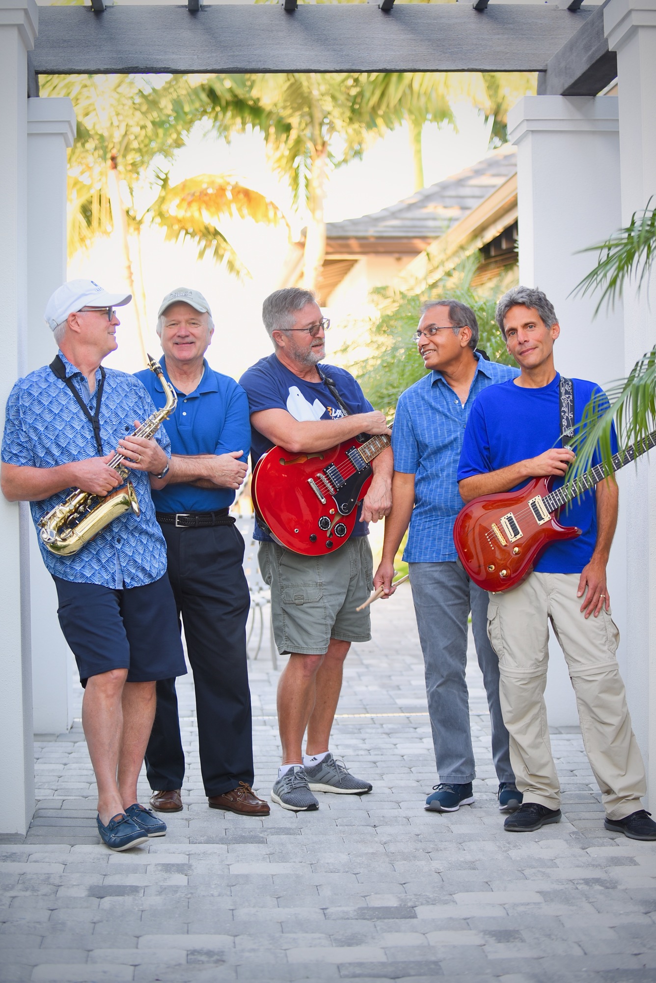 Birds of Play: The Blue Pelicans’ Ken Combs, Bob Sharak, Bill Irvan, Anil Warrier and Tom Perillo evolved from a loose two-man jam session into a full-blown cover band.