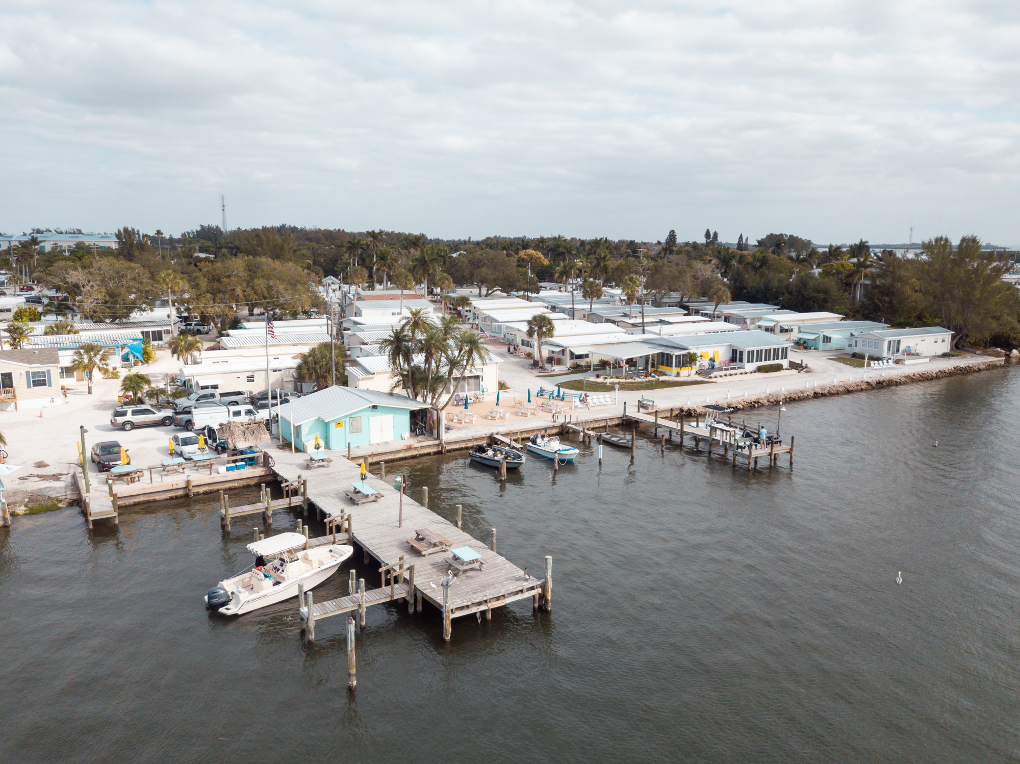 You won’t see high-rise buildings in Cortez Village. Instead, simple waterfront homes, cottages and vintage mobile home parks dot the shoreline.