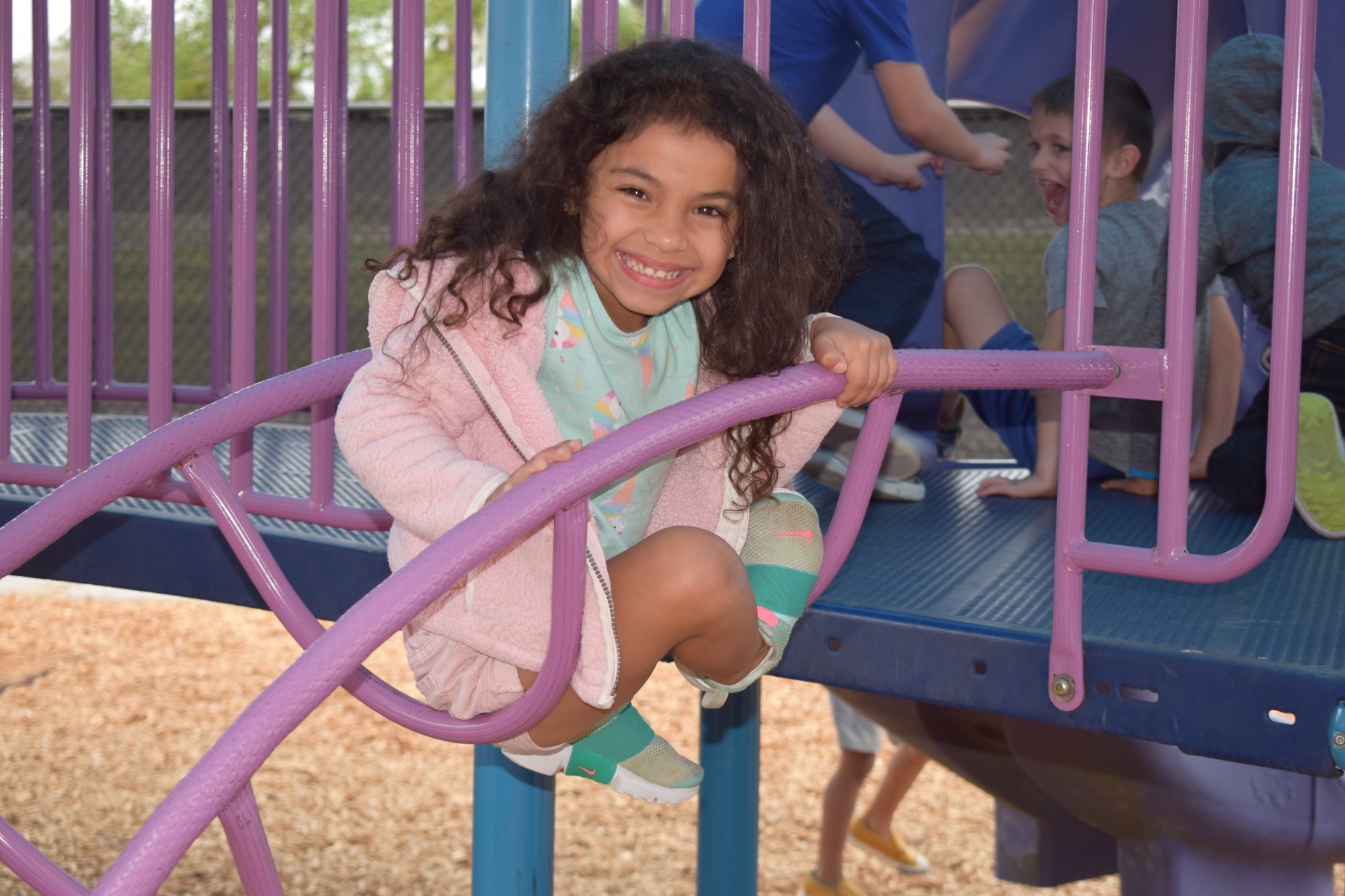 Mariamarie Soto Negron, a rising first grader, enjoys playing on the playground at B.D. Gullett Elementary School. Outdoor activities that allow for social distancing will be encouraged next year. File photo.