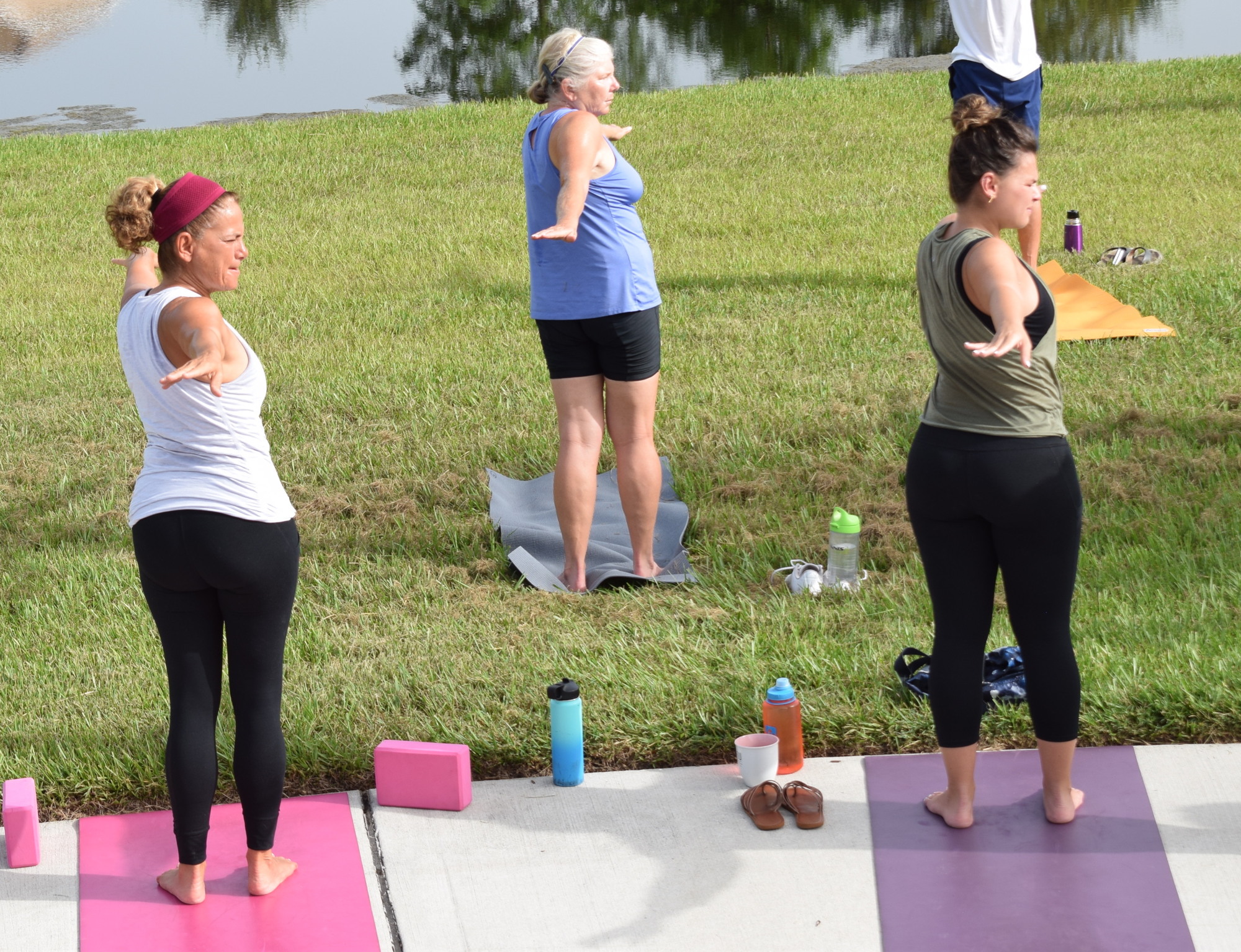 Esplanade's Shelley Chinskey, Patty Doyle and Brenda Nusbaum warm up as the session begins.