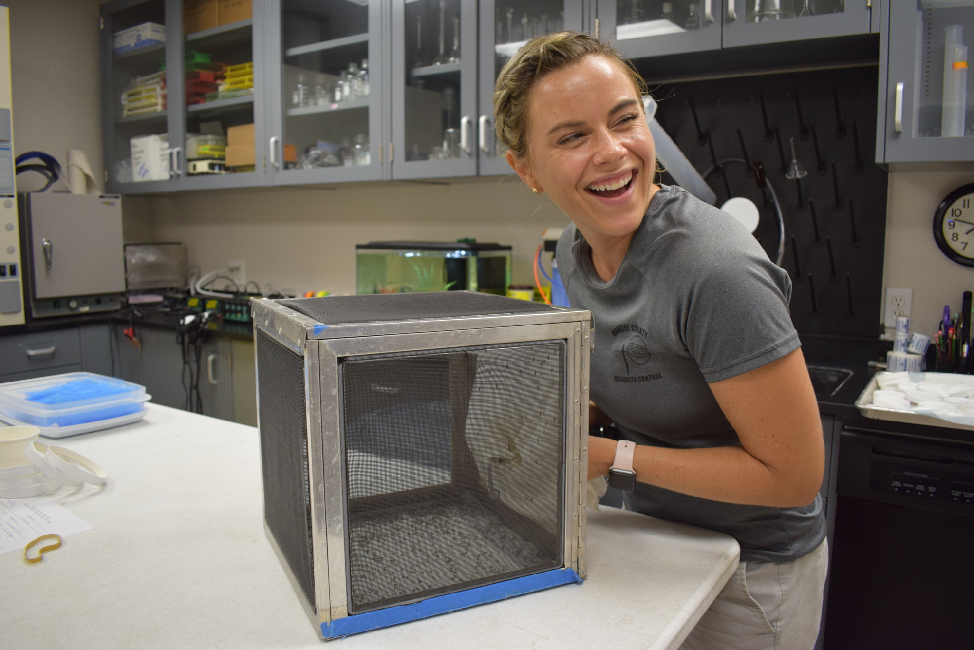 Research biologist Katie Williams tests the effects of chemicals on the mosquitoes.