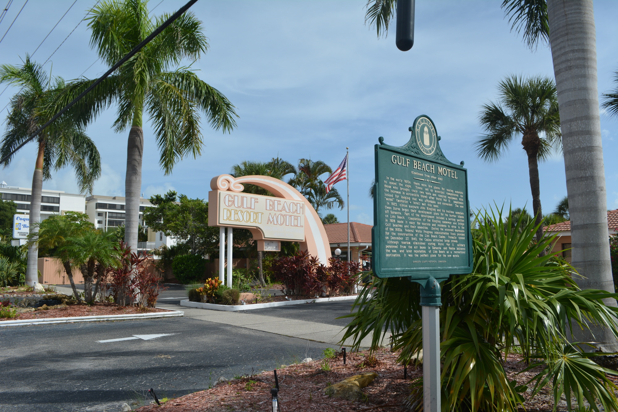 A county historical marker outside the Gulf Beach Motel notes the complex’s status as the first in a series of post-World War II motels on the beach.