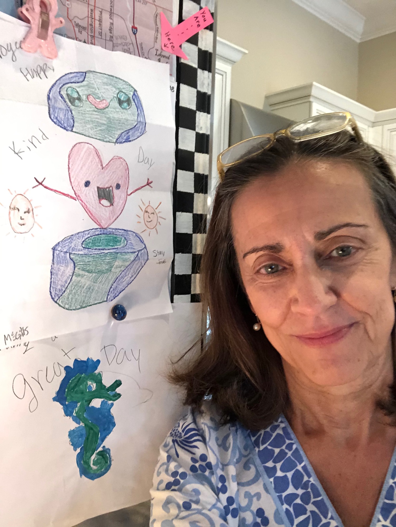 Silverwood's Sharon Catalano hangs the pictures she received from Colton and Kinley McGill on her fridge. Courtesy photo.