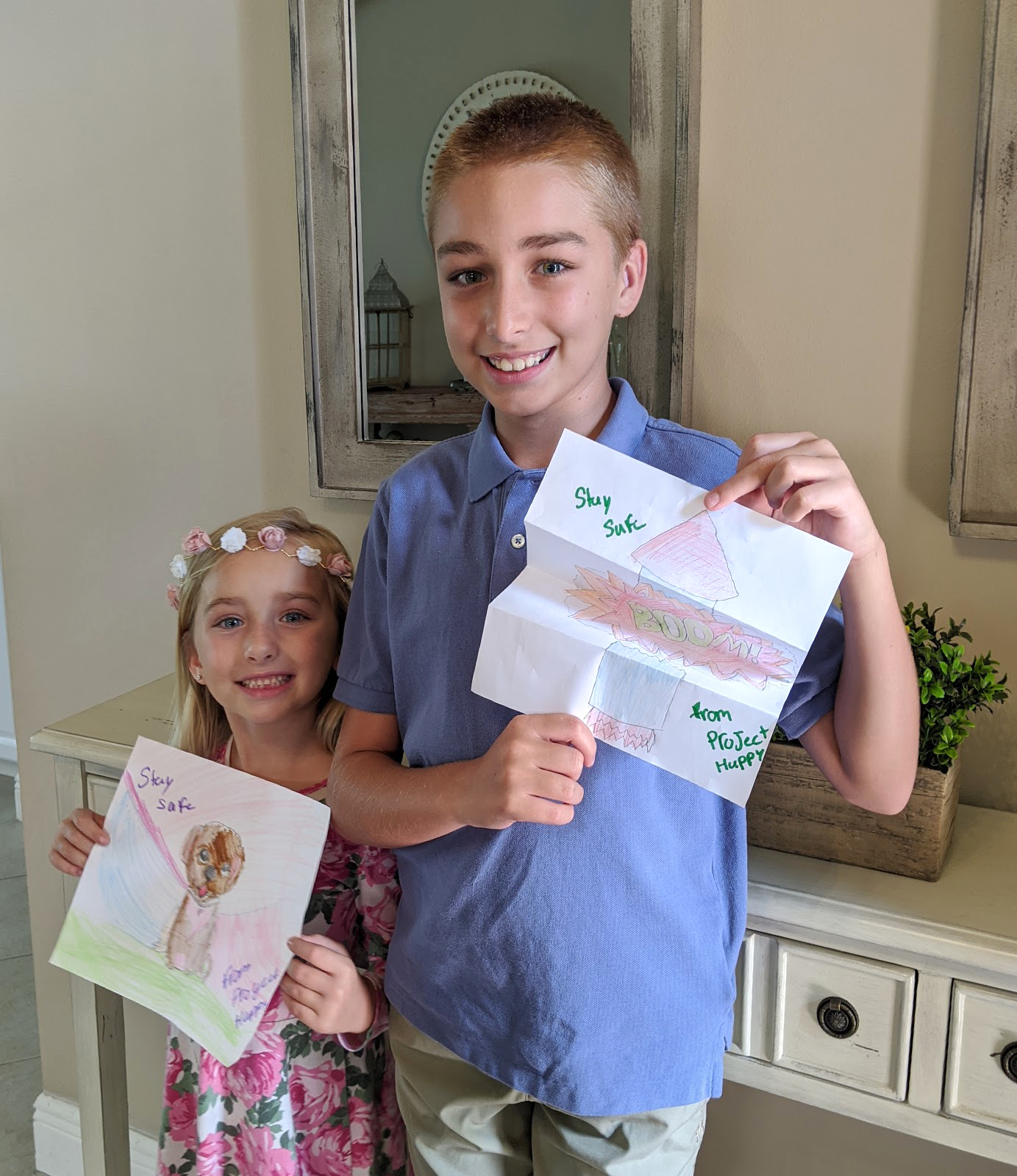 Kinley McGill, who is 6 years old, and her 10-year-old brother Colton start Project Happy to put smiles on people's faces during the COVID-19 pandemic. Courtesy photo.