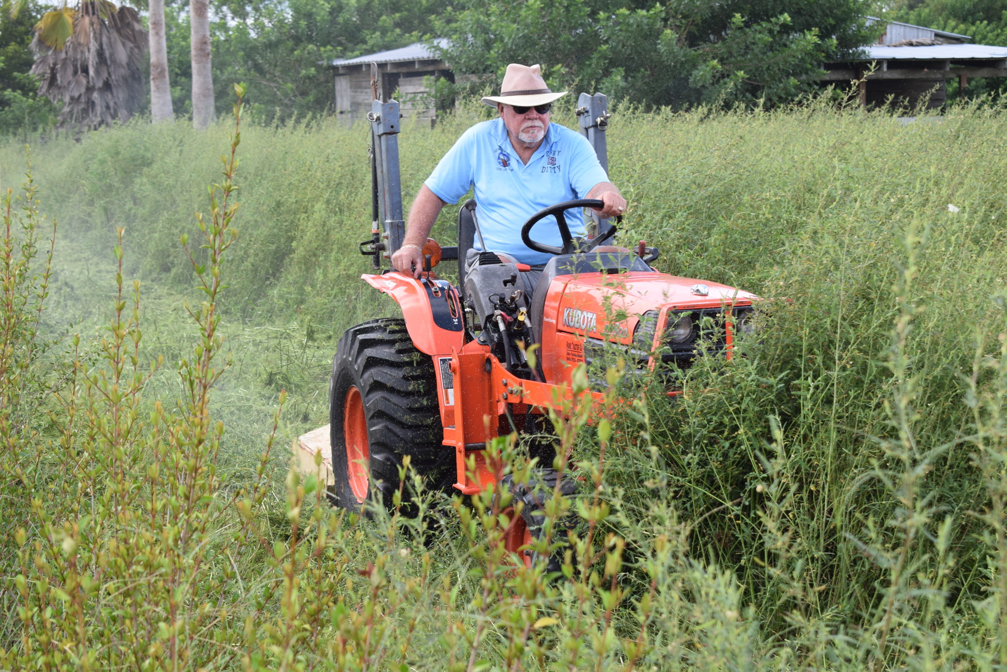 Elks Exalted Ruler Jerry Ditty donates his time to mow the Humane Society at Lakewood Ranch property.
