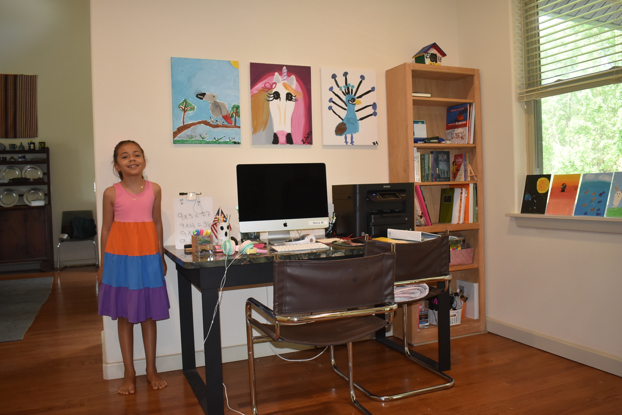 Zuleika Zunz has a desk space set up for her school.