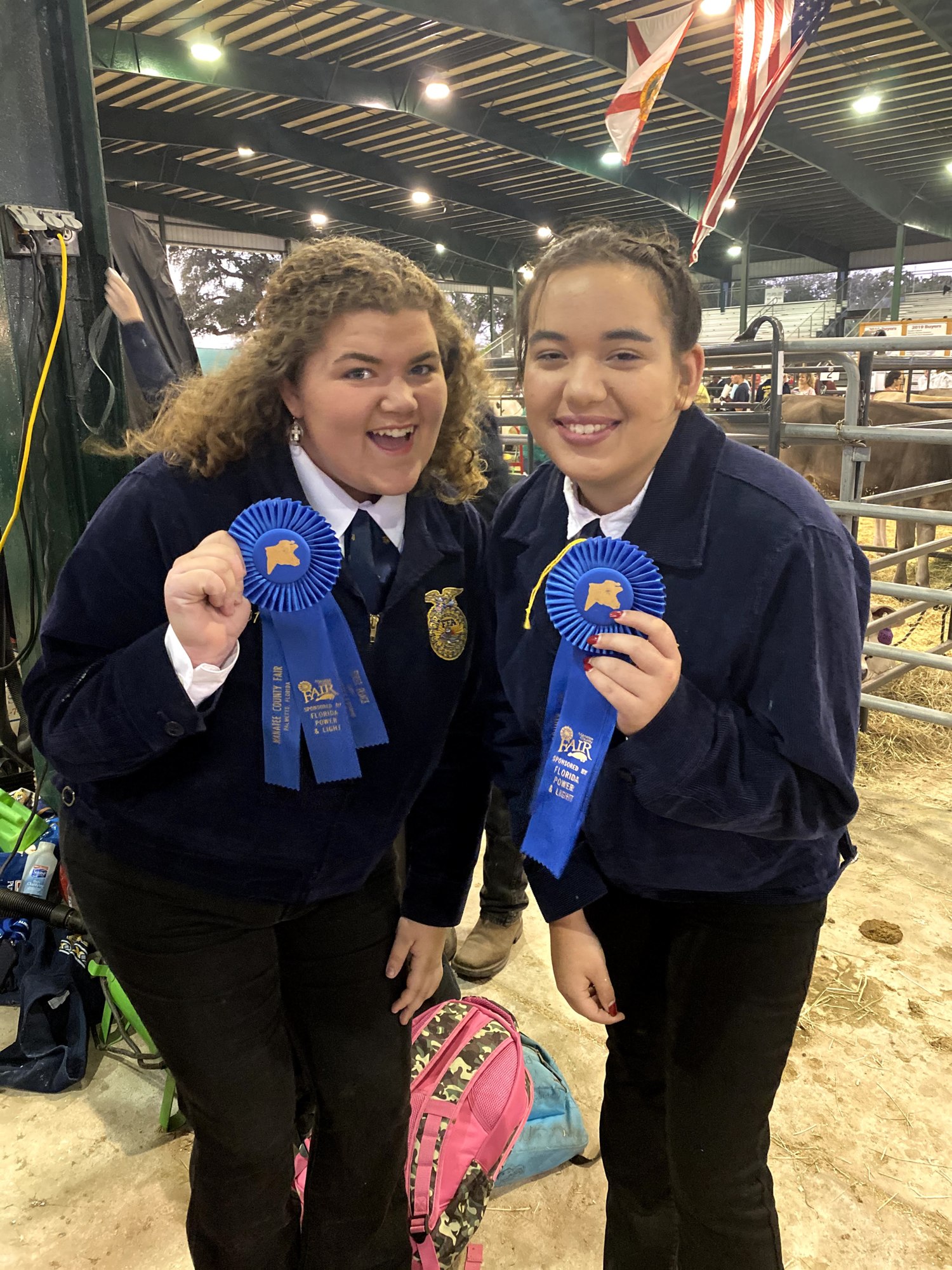 Lakewood Ranch High FFA members Madison Hartwig and Madeline Fields show off their ribbons. Hartwig wants to continue the success of the chapter while recruiting new members. Courtesy photo.