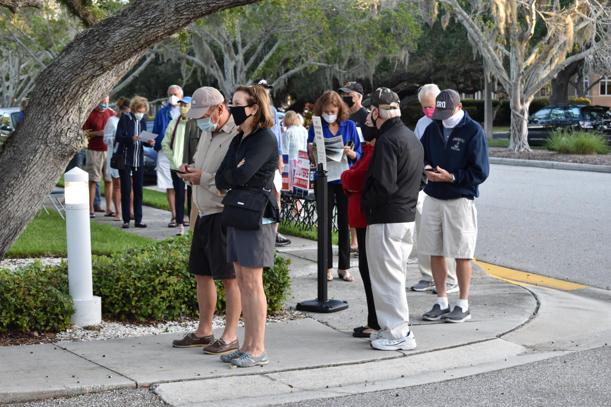 The line of people at Town Hall’s Precinct 201 wrapped around onto Bay Isles Road.