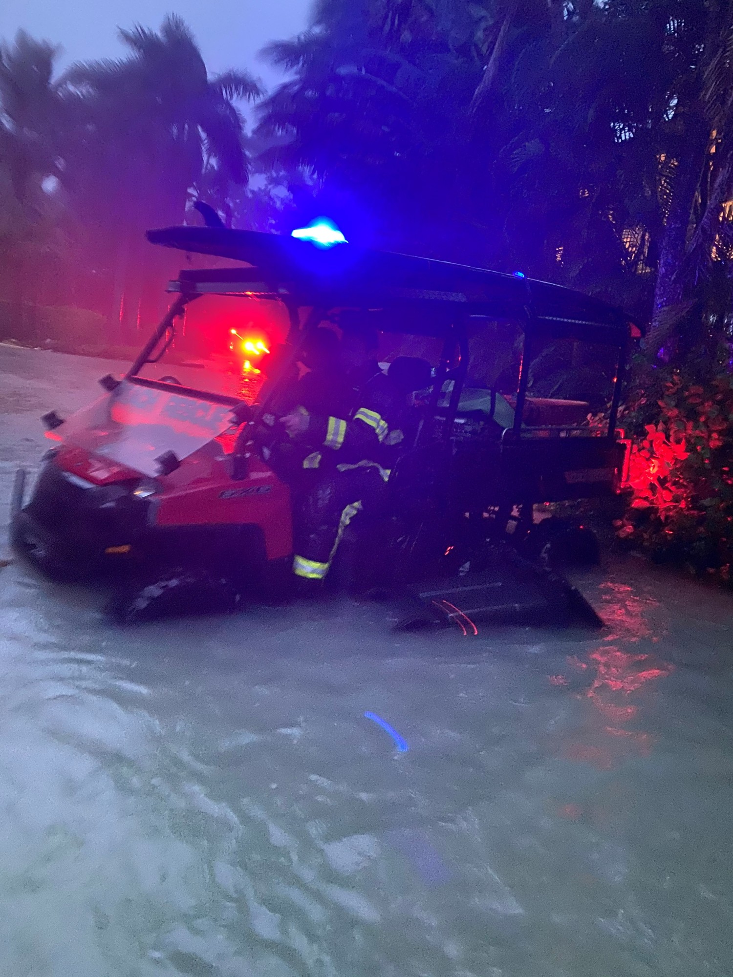 Longboat Key Fire Rescue personnel use an all-terrain vehicle to navigate flood waters.  (LBKFR photo)
