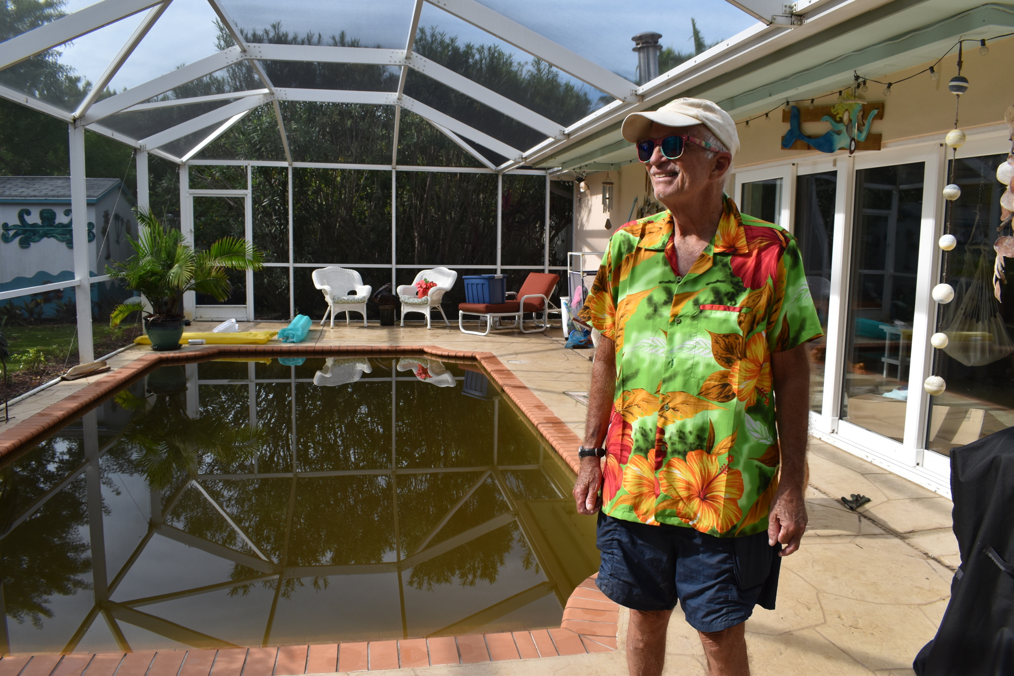 The stormwater from Eta caused Fred Kagi's pool to overflow. The water flooded Kagi's home.