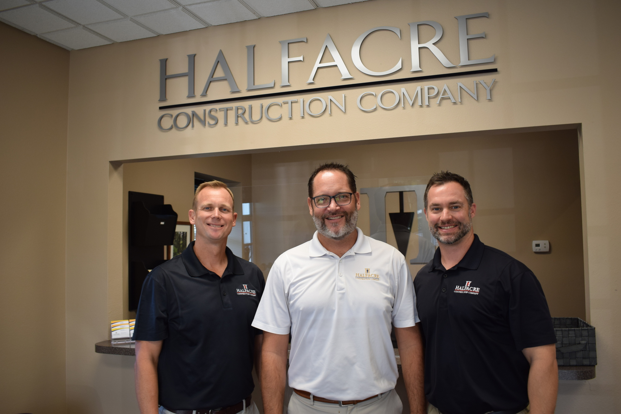 Tom Rees, Reed Giasson and Greg Witt all moved up through the ranks at Halfacre Construction and have been with the firm 16 years or more. By Jay Heater