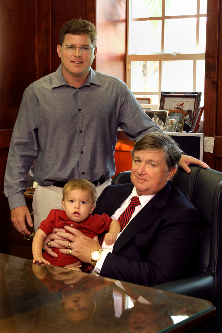 Jack Cox stands behind his son, Johnny, and dad, John Cox, in 2005. Courtesy file.