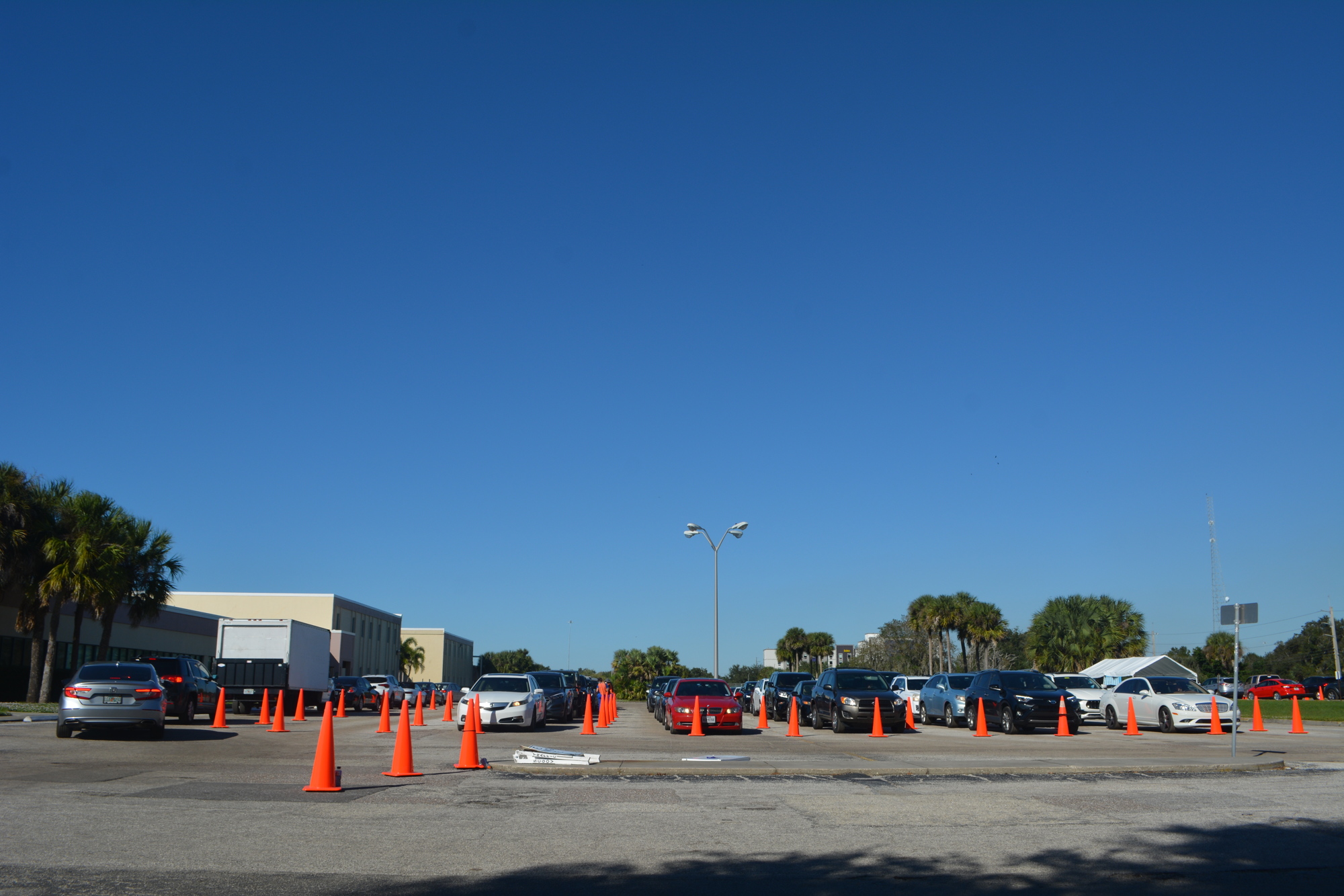 Cars wait in rows at the state-run drive-thru COVID-19 testing site at 100 Cattlemen Road on Monday, Nov. 23.