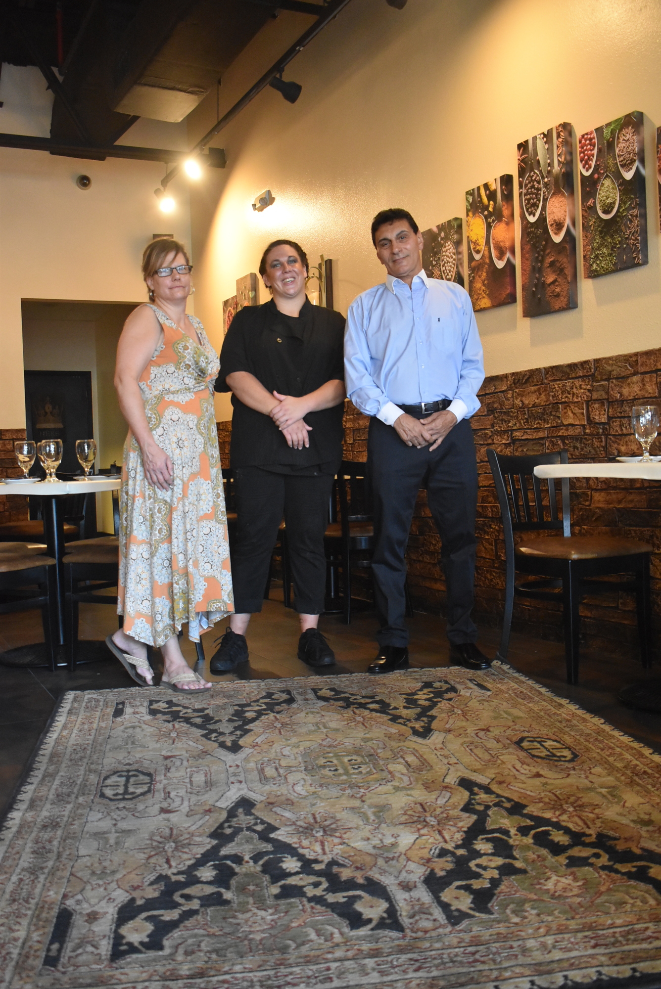 (From left) Sharie Kelly, Jennifer Ramsey and Nabil Rezkalla. Kelly and Rezkalla co-own Riviera Mediterranean Grille, while Rezkalla and Ramsey are both chefs at the restaurant.
