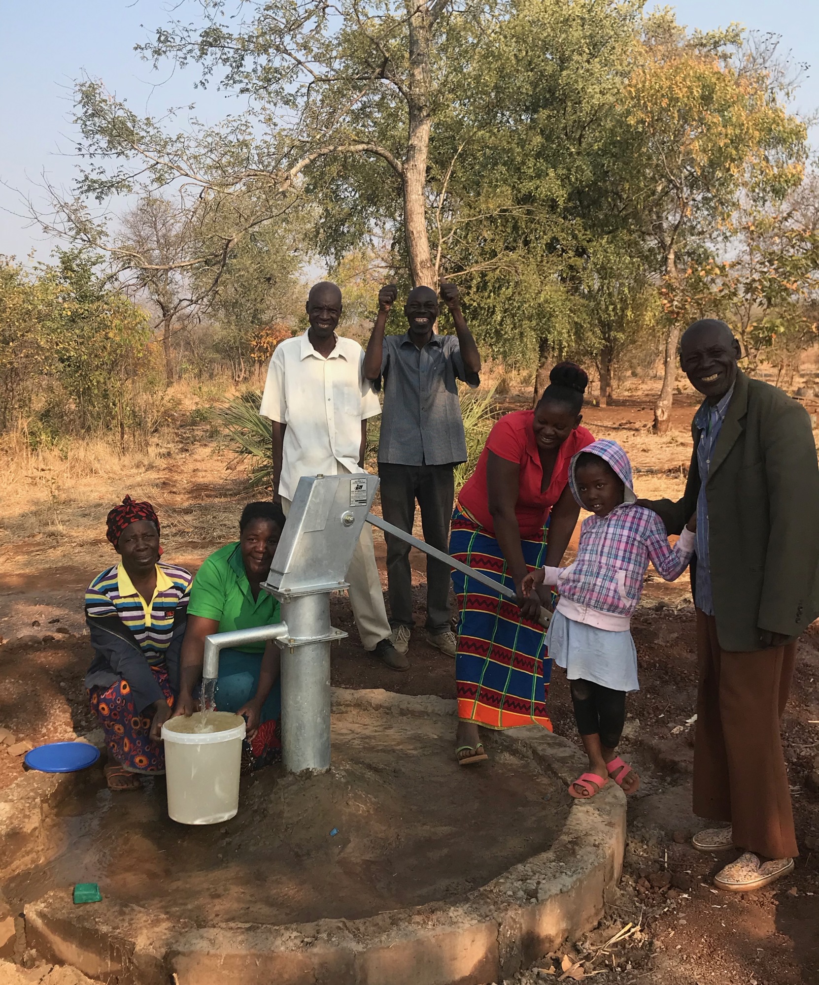 Villages sent photos after the wells were built in Zambia.