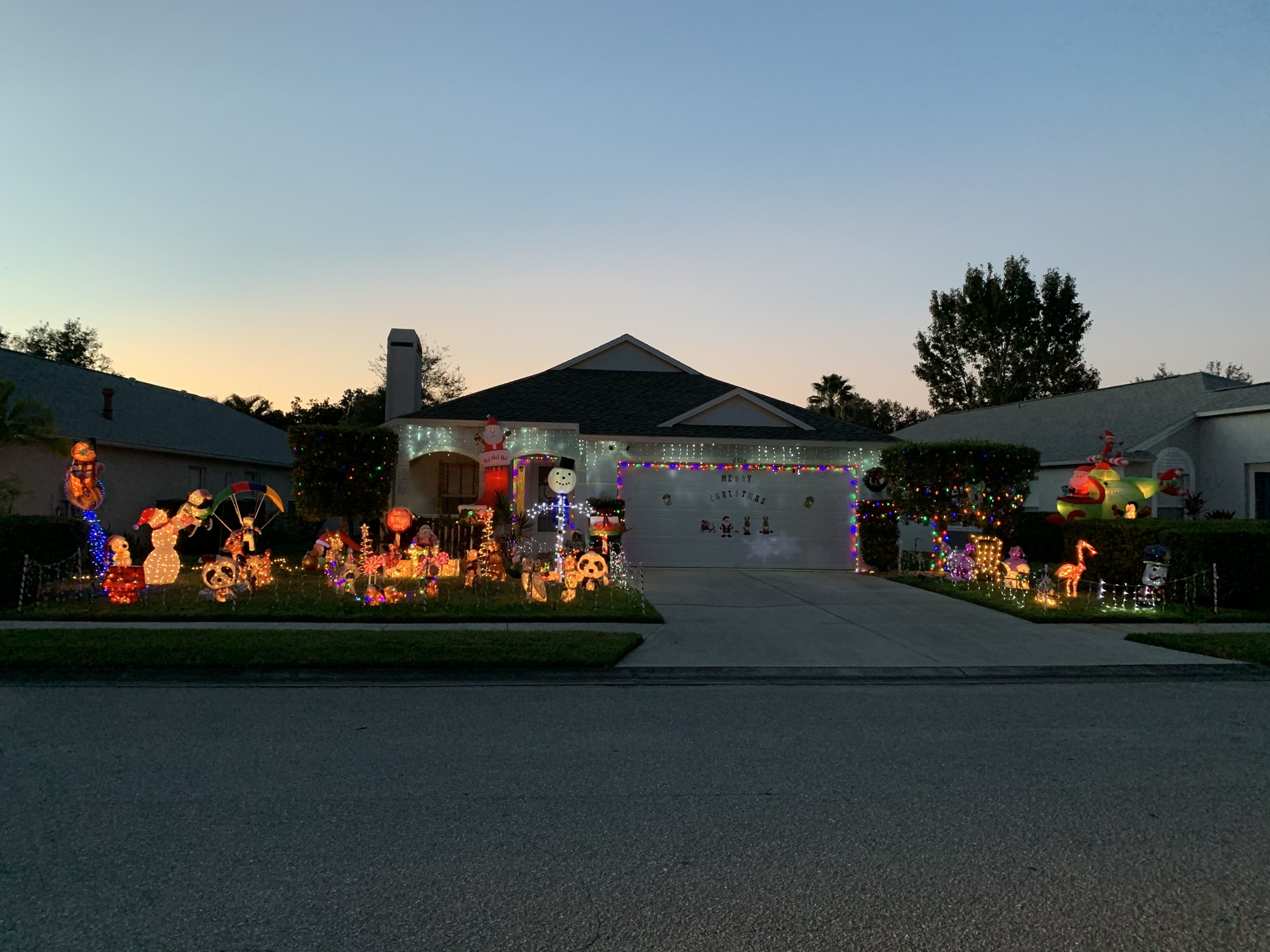 Families come from all around Lakewood Ranch to visit Ray and Patti Papiano's Summerfield home to see the light display. Photo by Liz Ramos.
