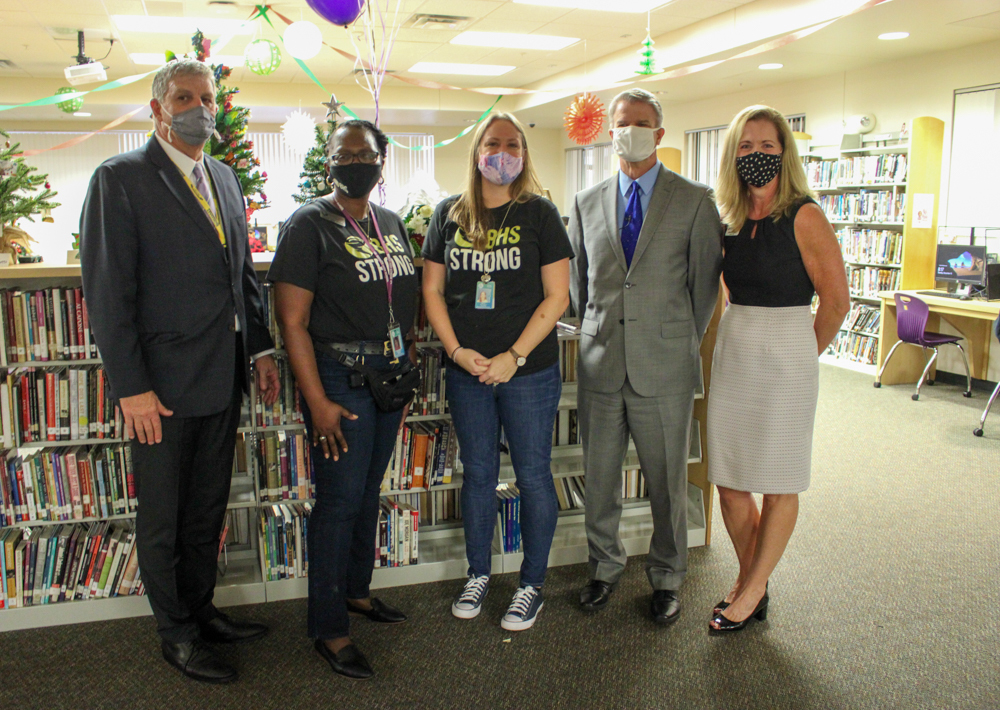 Administrators surprise Becky Satterly, a math teacher and dropout prevention coordinator at Booker High School. Photo courtesy