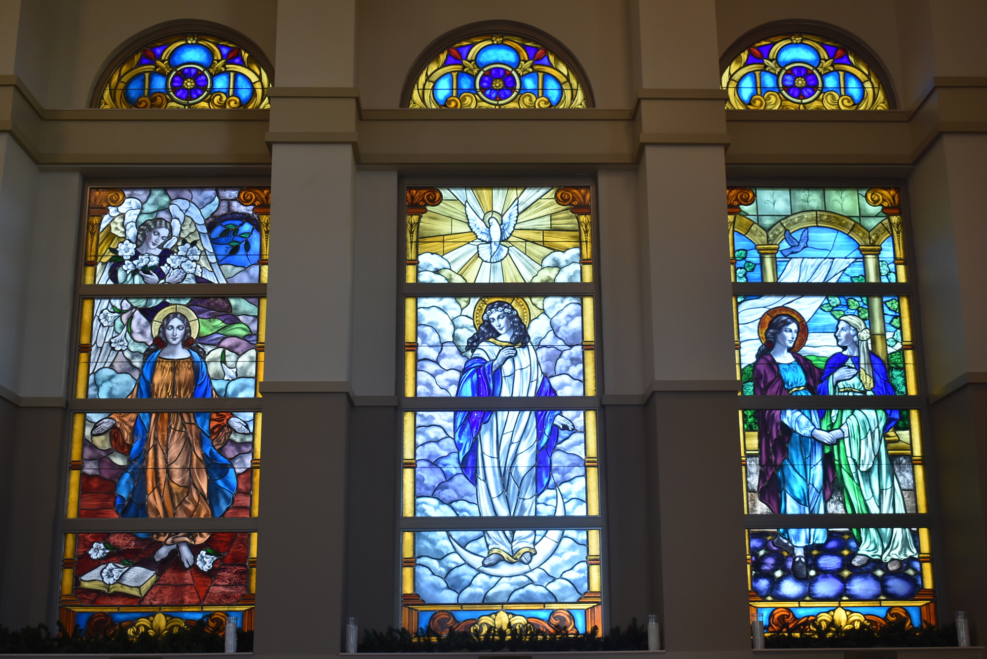 These stained glass windows, installed at Our Lady of the Angels in 2020, depict the annunciation from the angel Gabriel to Mary, the assumption of Mary into Heaven and the visitation of Mary to St. Elizabeth.