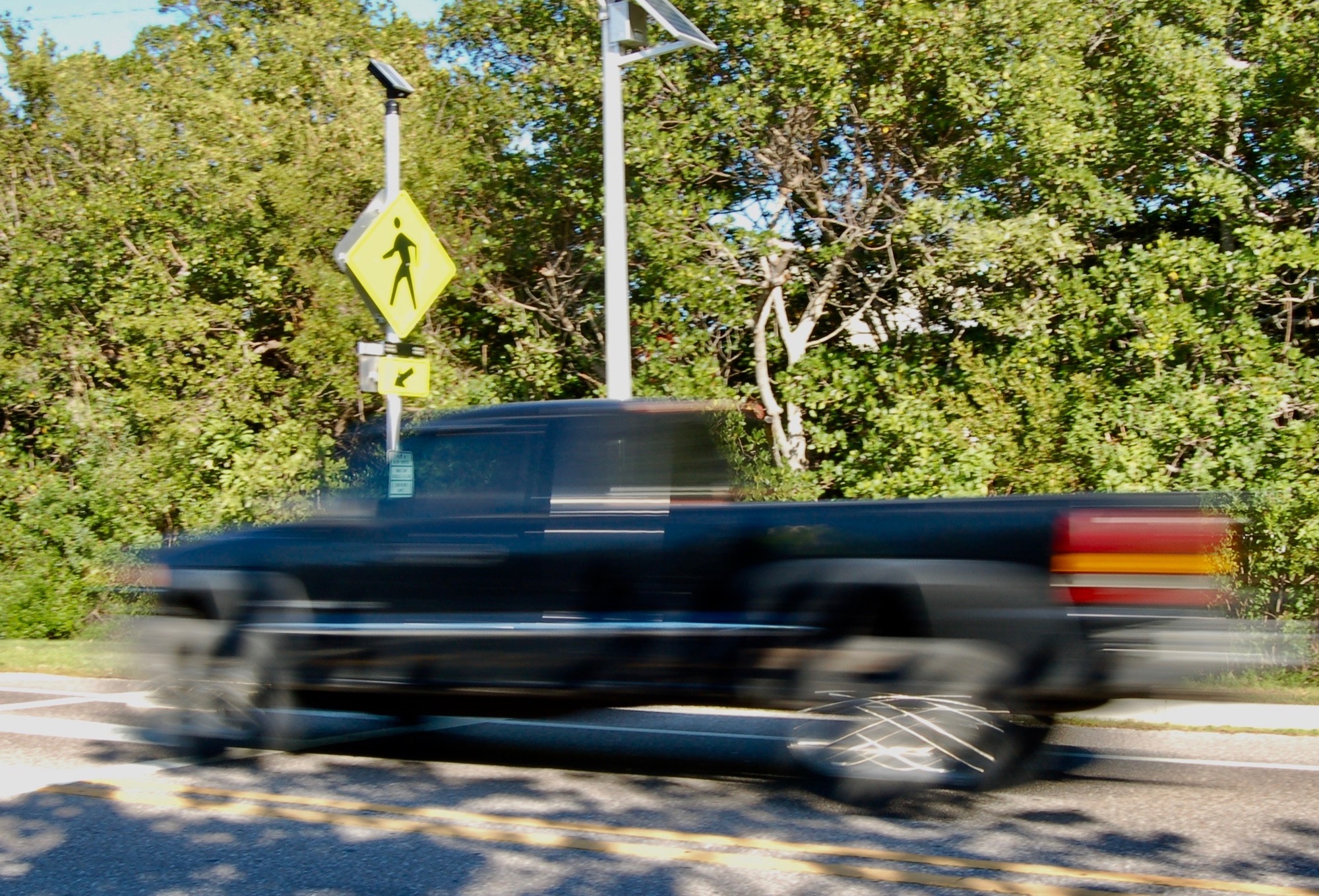 Vehicles are required to stop when the lights are activated and pedestrians are present. 