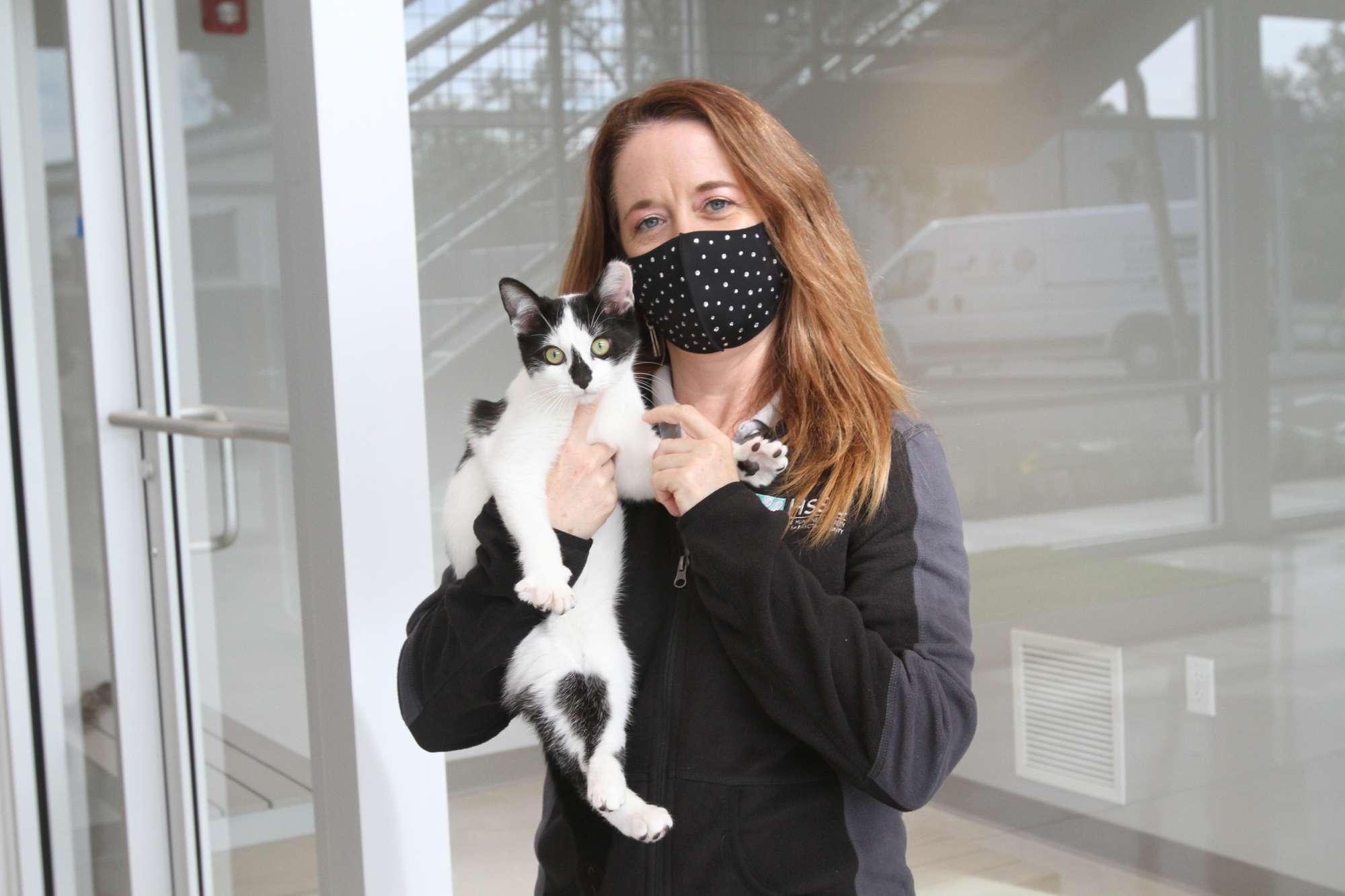 Executive Director Anna Gonce and Pierre the cat.