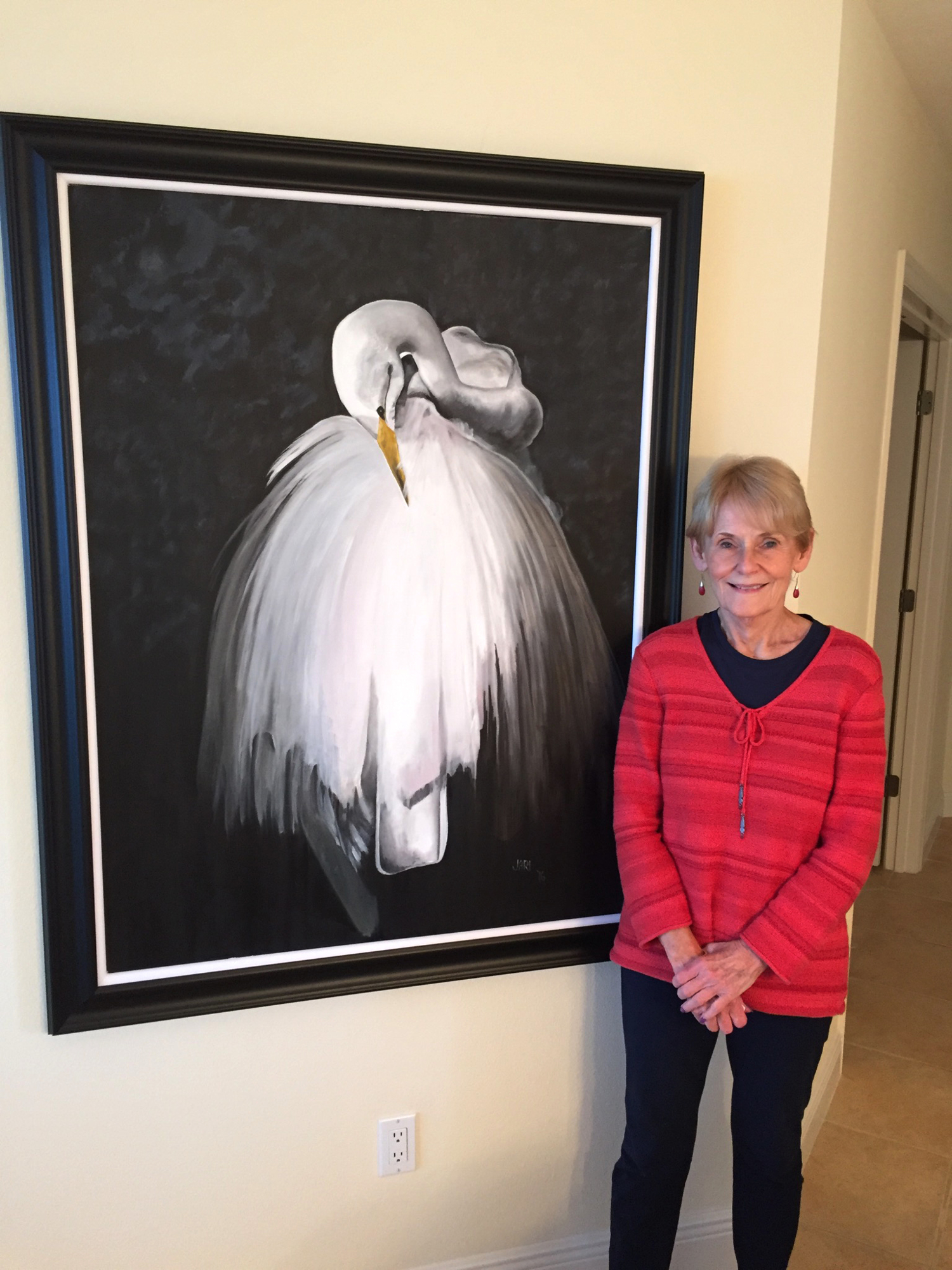 Jari Searns, a member of the Women of WaterCrest, raises money for Mothers Helping Mothers by selling her paintings. Courtesy photo.