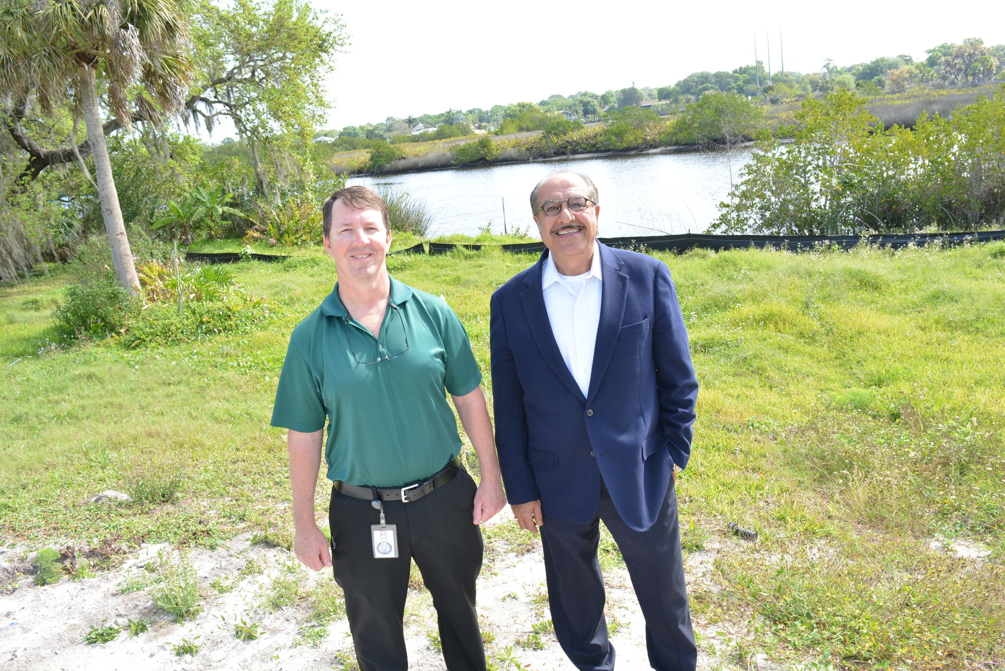Manatee County Project Manager Eric Shroyer and former Deputy Director of the Engineering Services Division Sia Mollanazar stand in front of the Braden River. A bridge will be constructed over the river to extend 44th Avenue. File photo.