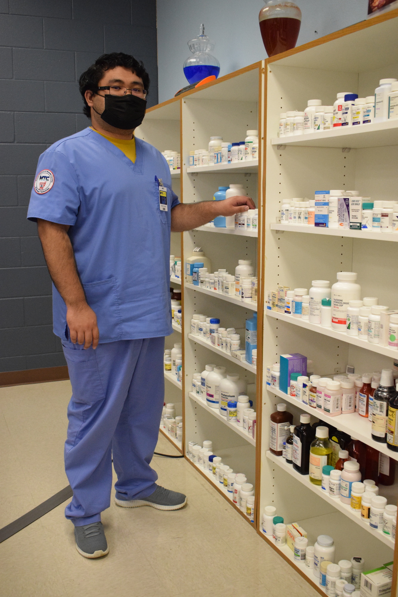 Zodock Sturgis, a Pharmacy Technician student, is preparing for his national certification exam. A hybrid schedule will be offered for Pharmacy Technician students in the fall.