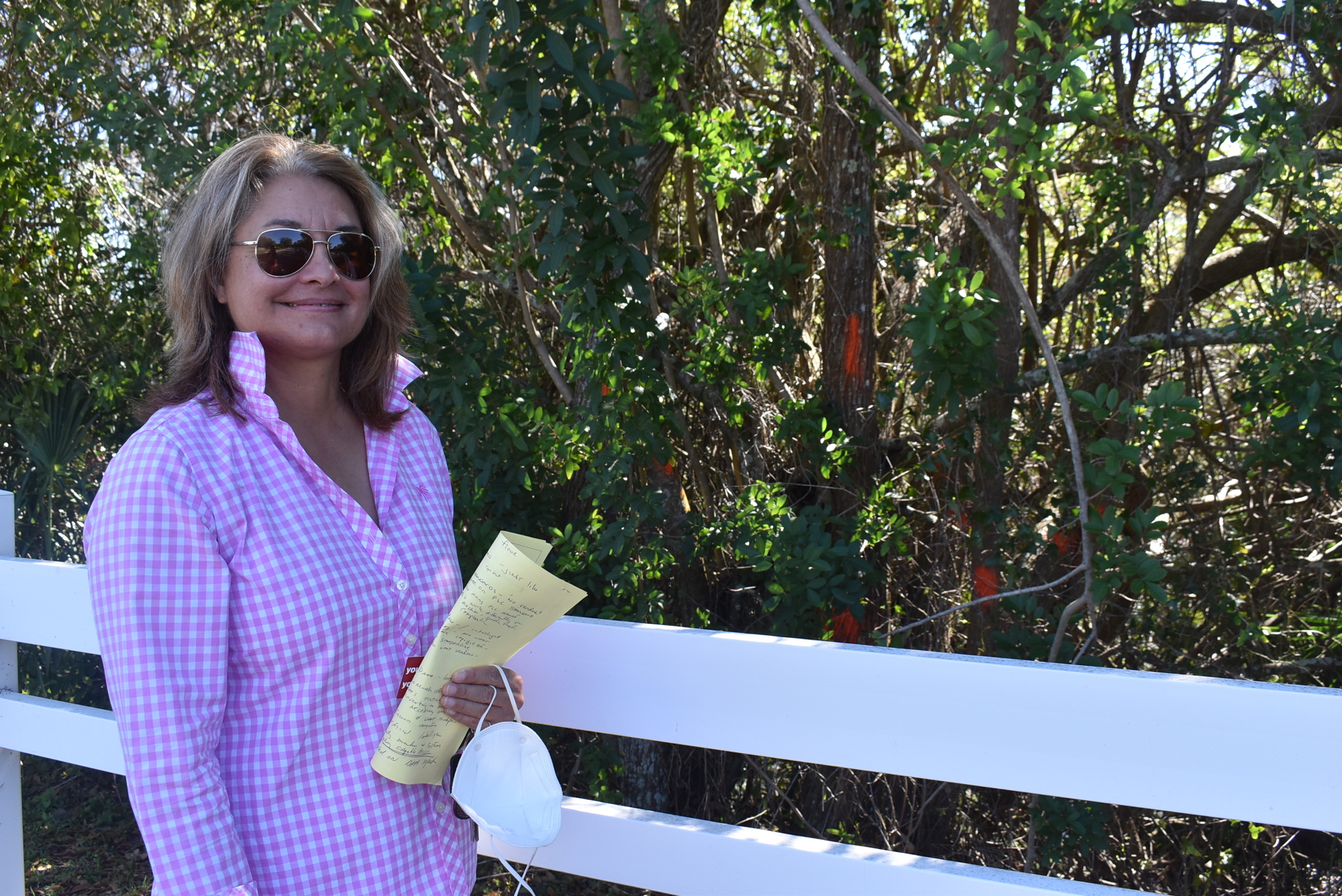 Mote Ranch HOA Board Director Brenda Miller is excited to remove invasive Brazilian pepper trees from Old Farm Road. She hopes the removal will allow native species to thrive, creating an 