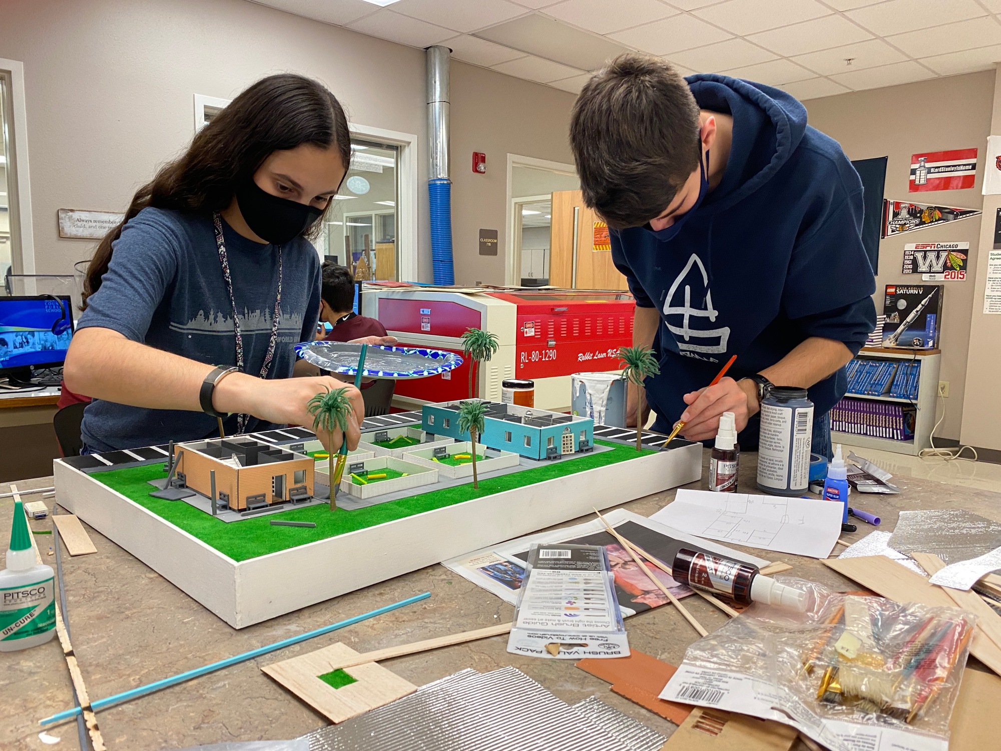 Isabella Pasquale and JT Wright, members of Braden River High School's TSA team, work to complete an architectural model. Courtesy photo.