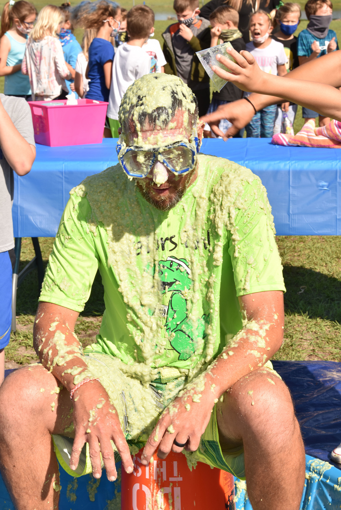 Principal Todd Richardson gets slimed by more than 250 students during the annual walk-a-thon. Richardson's incentives helped the school raise nearly $70,000, the highest in the school's history. Courtesy photo.