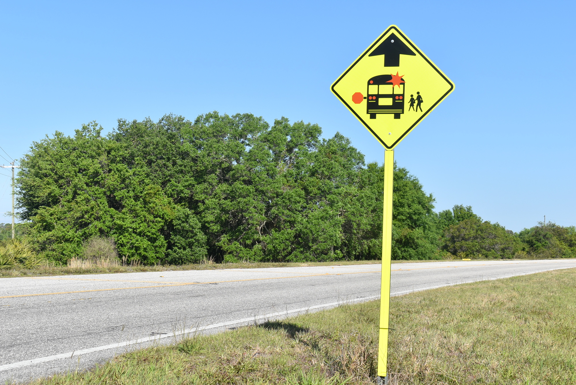 A bus stop is located near the northern end of Myakka City's 