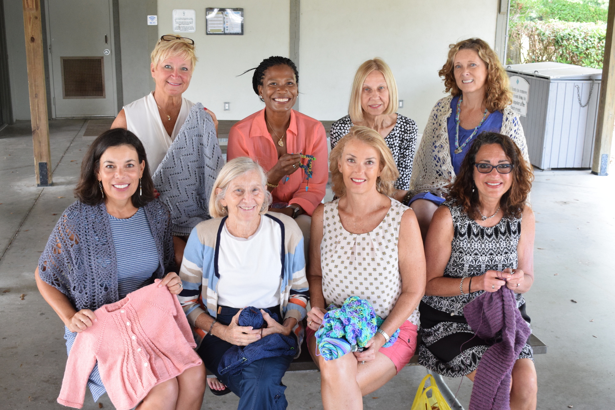 East County's (back) Nancy Skibinski, Shelly Hopkins, Cindy Wasko, Laurie Riehn, (front) Jo Jadin, Laurie Rosfeld, Kathy Wright and Sarah Montemarano gather at Greenbrook Adventure Park to knit while socializing.