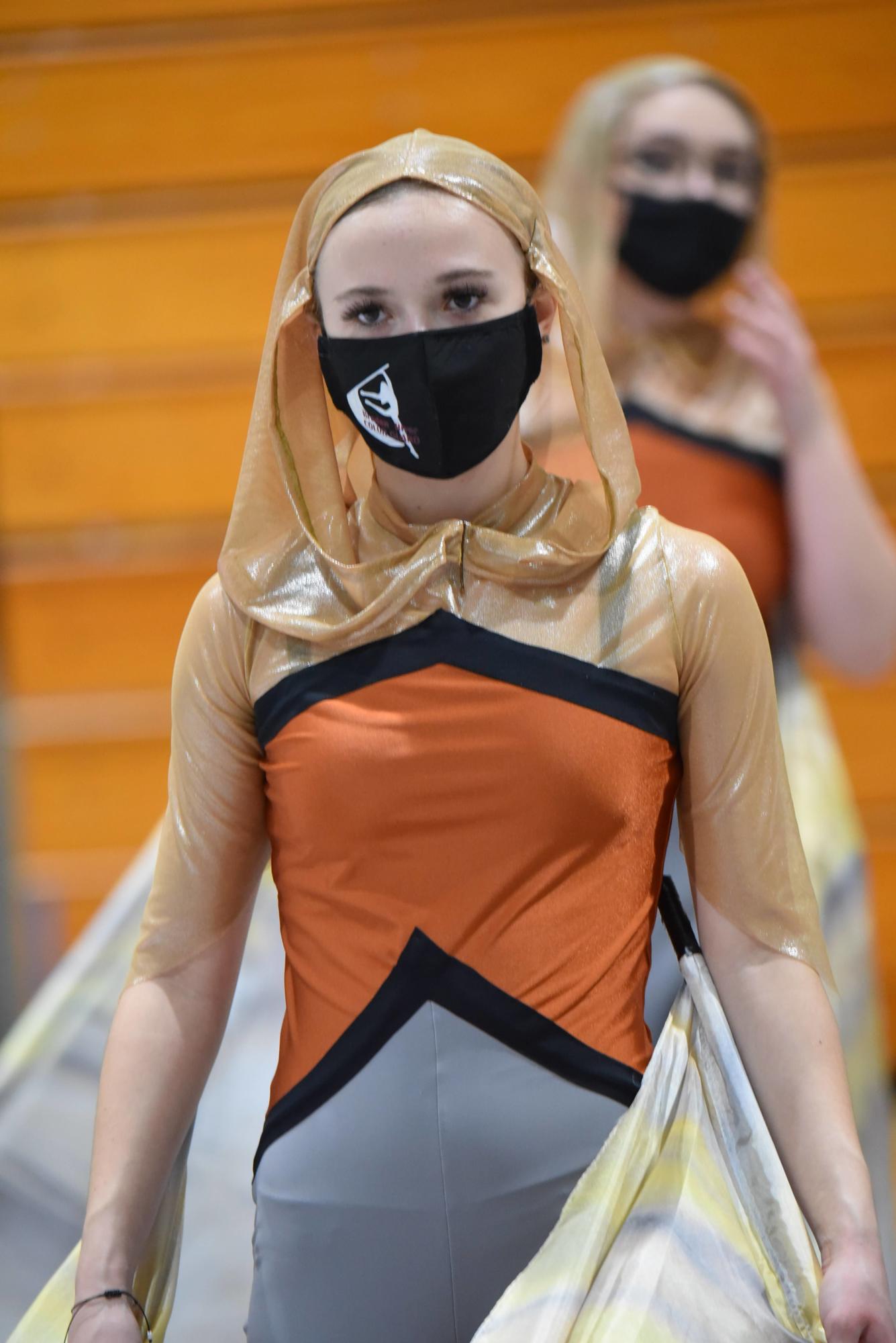 Lauren Costello, a sophomore in Braden River High School's JV winter guard, gets ready to perform. Courtesy photo by Chris Stratford.